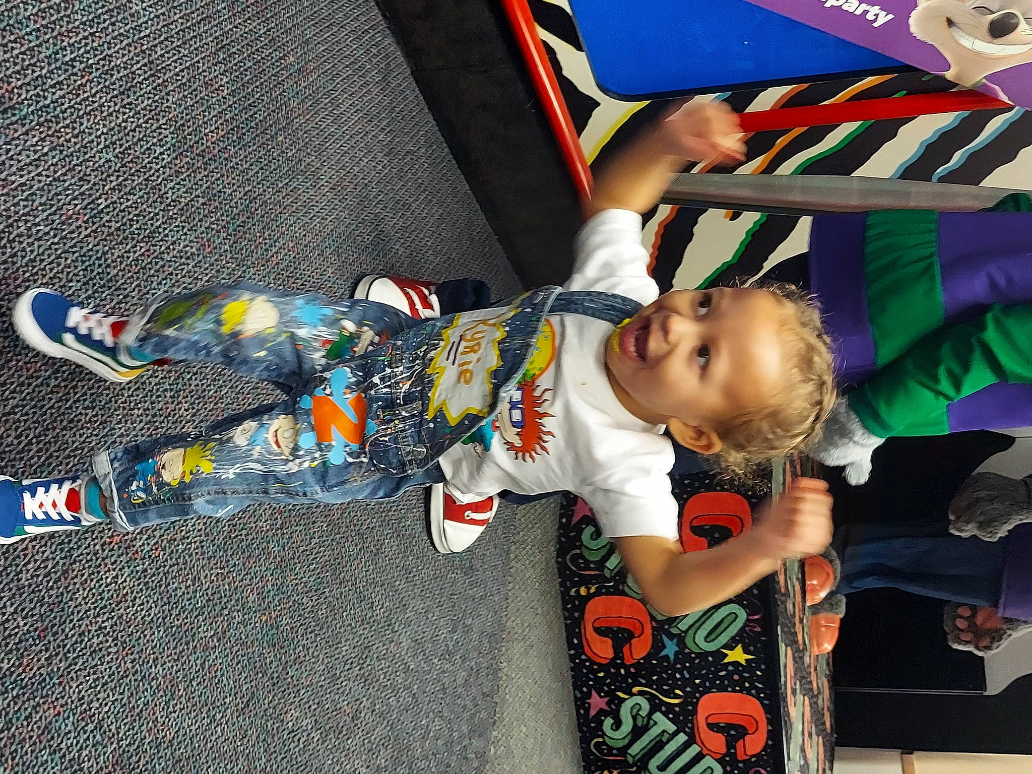 Kyrie joined the competition — help win amazing prizes! baby, baby_products, baby_toddler_clothing, carmine, child, facial_expression, flooring, fun, happy, leisure, orange, person, play, product, room, shorts, t_shirt, textile, toddler, toy