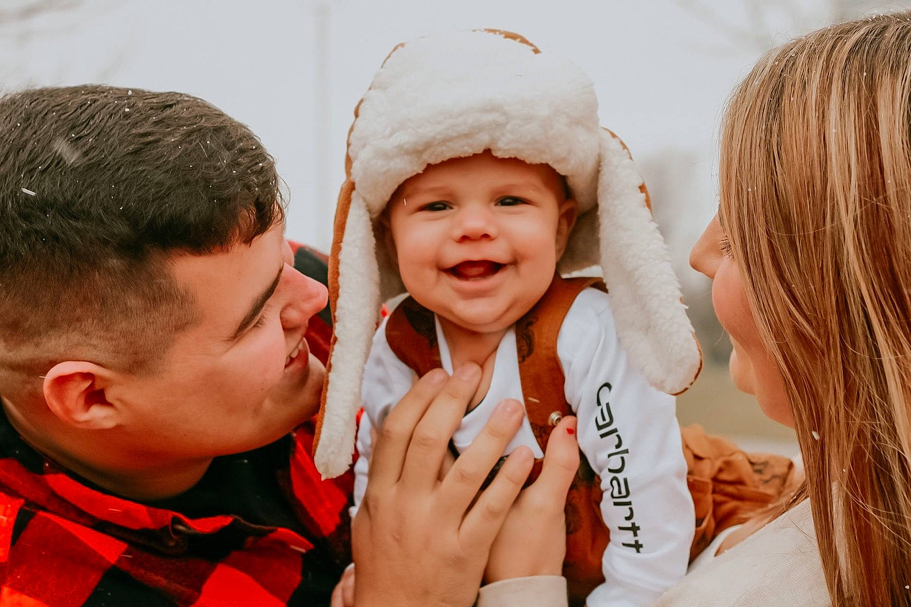 Everett is registered to the contest to win money with this photo: blue, cap, clothing, daytime, event, eye, face, finger, fun, green, hairstyle, head, headwear, human, joy, lip, people, person, product, smile