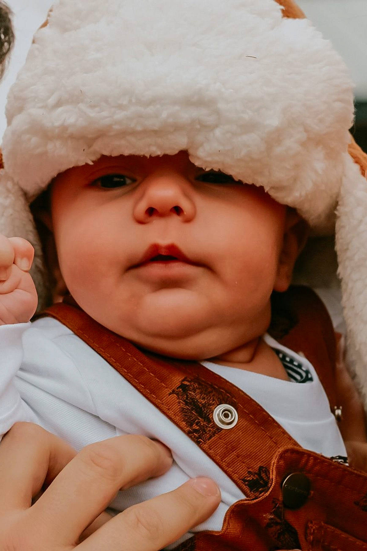 Everett joined the competition — help win amazing prizes! blue, cap, cheek, clothing, daytime, eye, face, finger, fun, green, hair, hairstyle, head, headwear, human, lip, people, person, product, vertebrate