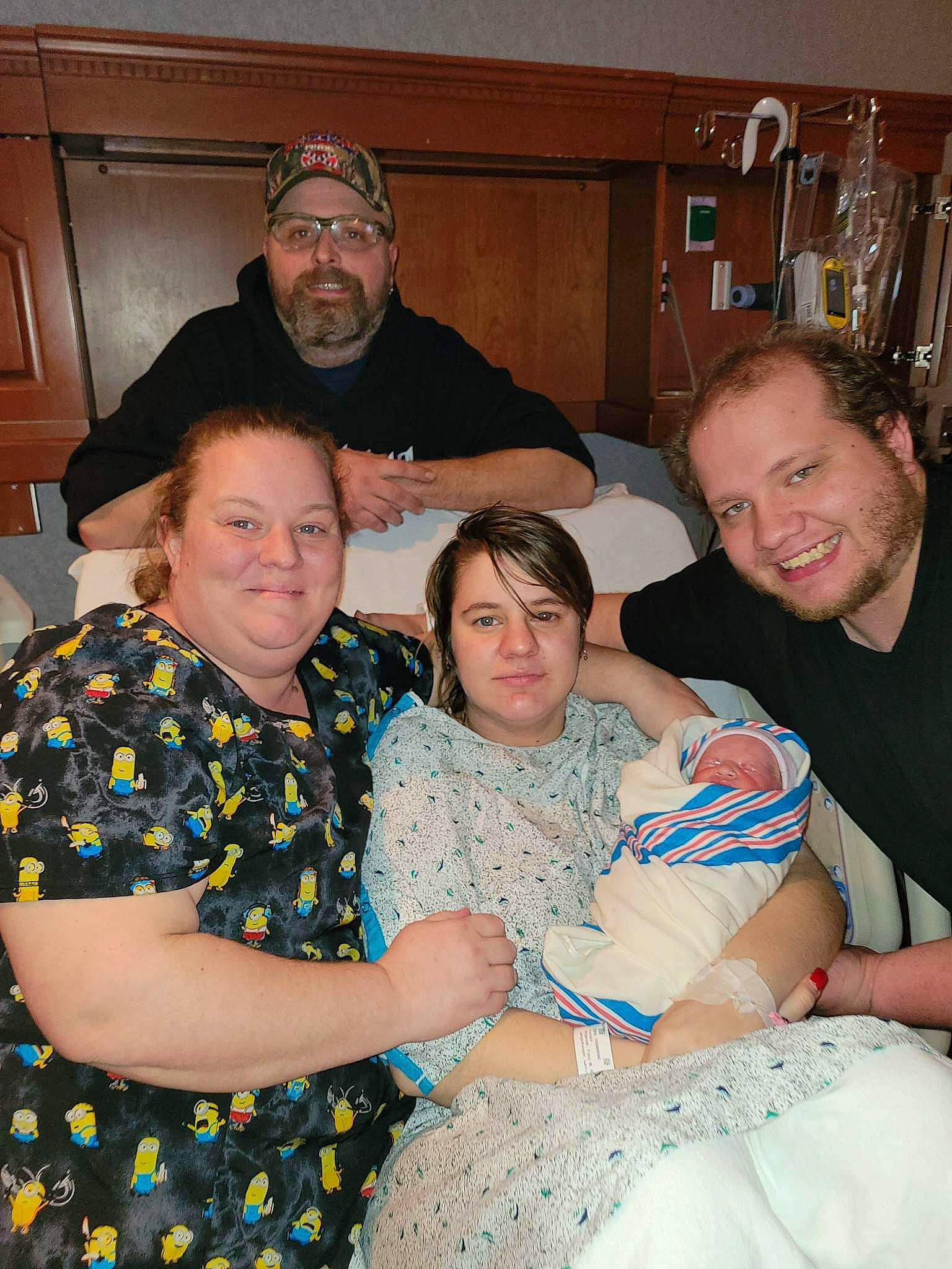 Lewis joined the competition — help win amazing prizes! beard, cabinetry, comfort, couch, door, event, facial_expression, family_pictures, friendship, fun, happy, headwear, interaction, joy, lap, organ, pattern, person, room, shelf