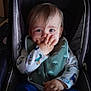 Adrien a rejoint le concours — aidez-le/la à gagner de superbes lots ! baby, bib, blue_pants, car_seat, child, clothing, comfort, cute, dinosaur_print, face, hand, indoor, infant, long_sleeve, person, playful, seat, smile, socks, young_child
