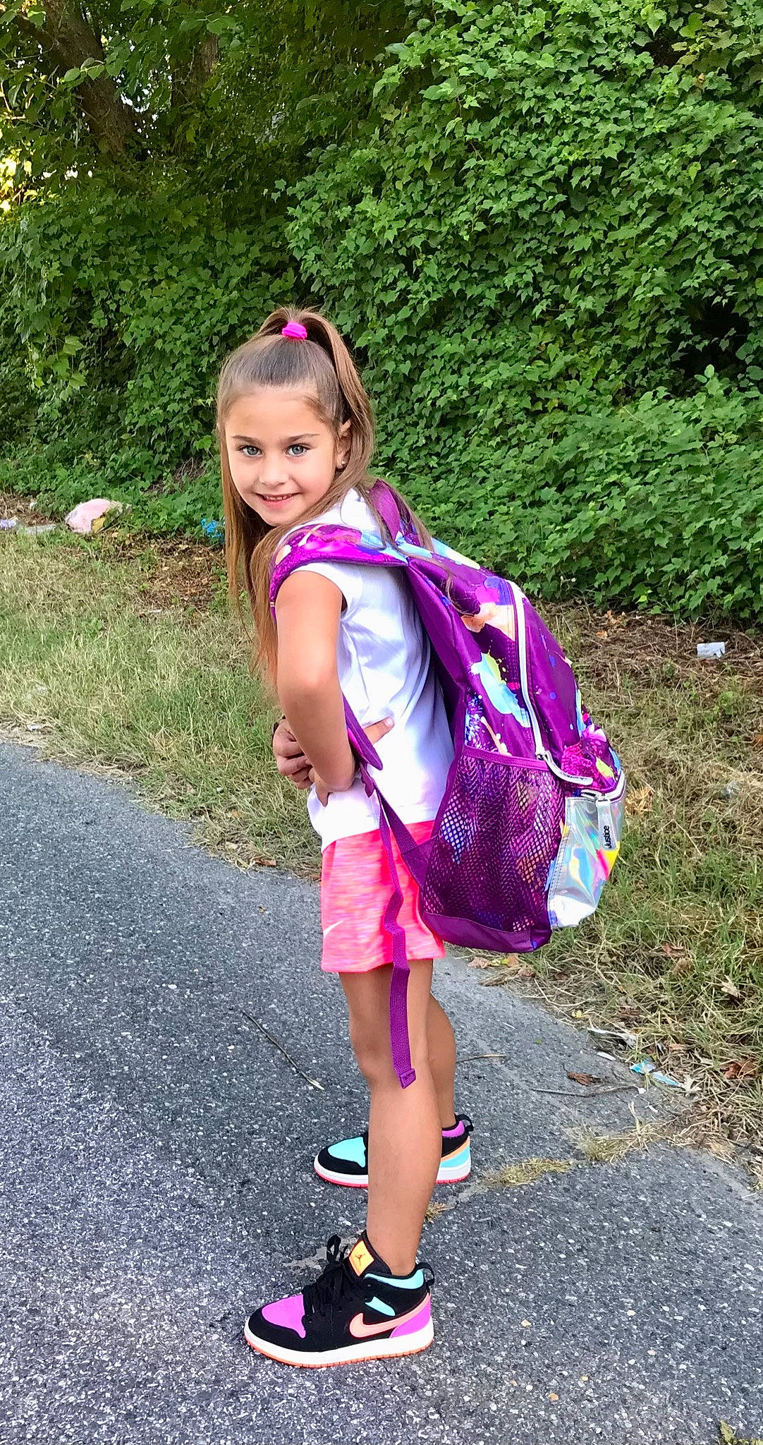 Alannah joined the competition — help win amazing prizes! asphalt, backpack, bag, electric_blue, fun, grass, happy, joy, leisure, luggage_and_bags, magenta, pattern, people_in_nature, person, pink, plant, purple, recreation, shoulder, smile