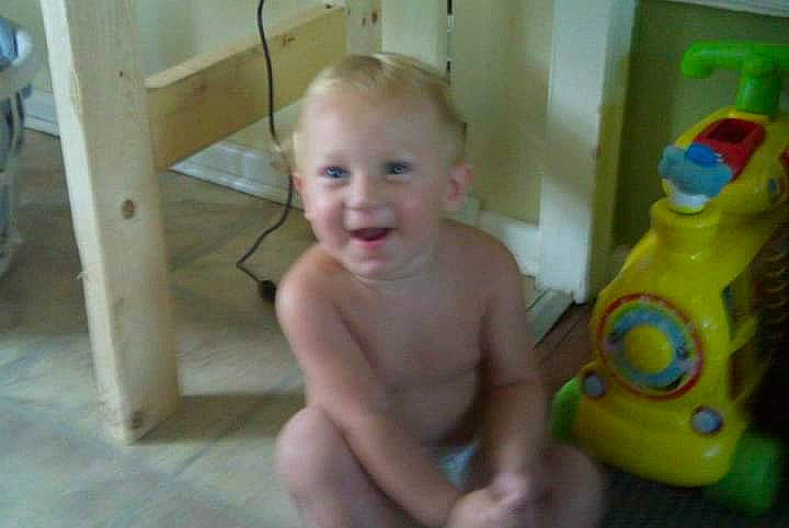 Collin joined the competition — help win amazing prizes! baby, baby_playing_with_toys, baby_products, baby_toys, chest, child, flooring, foot, fun, hardwood, person, plastic, plastic_bottle, play, room, smile, thumb, toddler, toy, wood