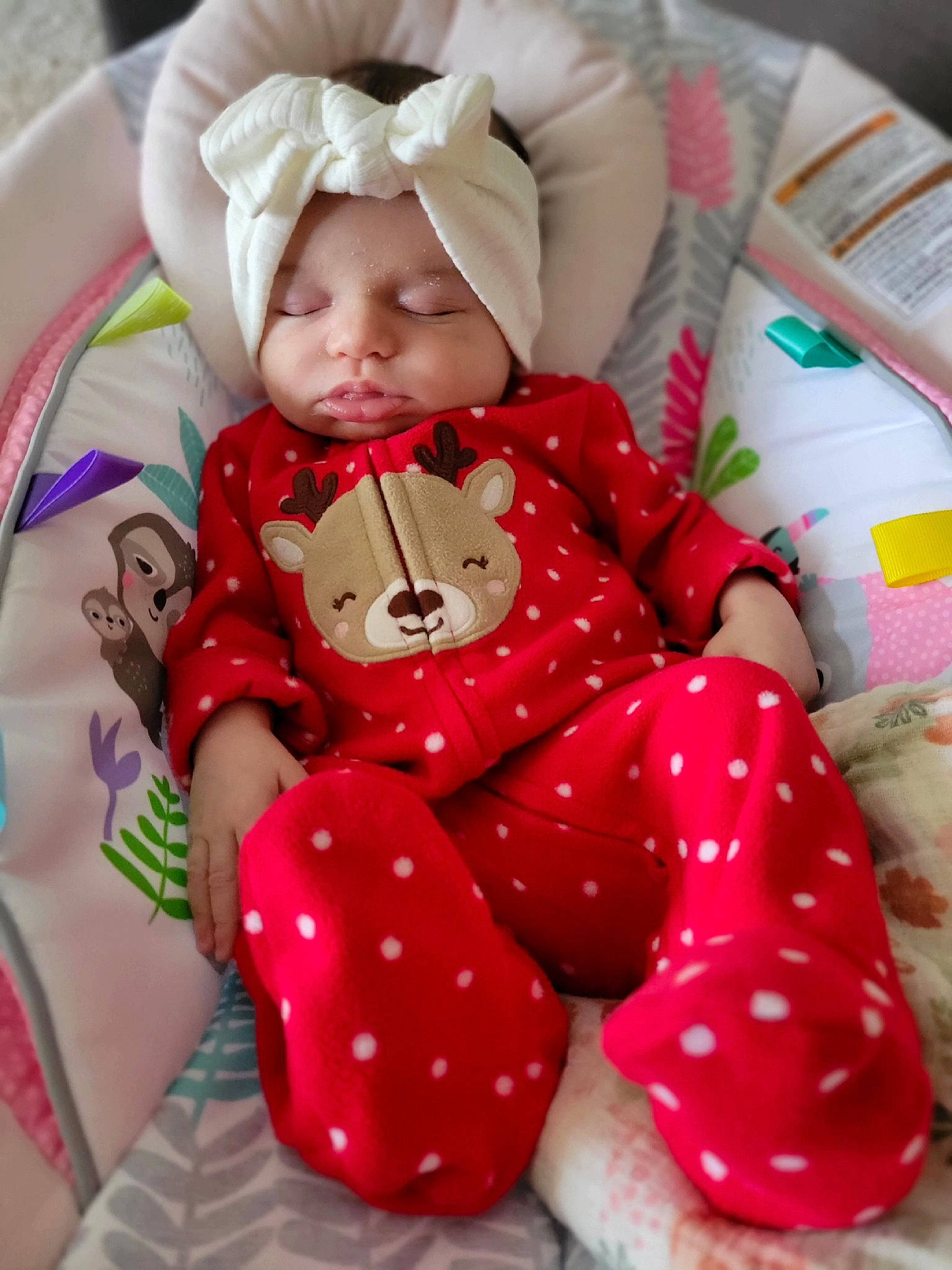 Cora joined the competition — help win amazing prizes! baby, baby_products, baby_toddler_clothing, carmine, child, comfort, fashion_accessory, head, headwear, linens, pattern, person, pink, product, sitting, skin, sleeve, sock, textile, thigh