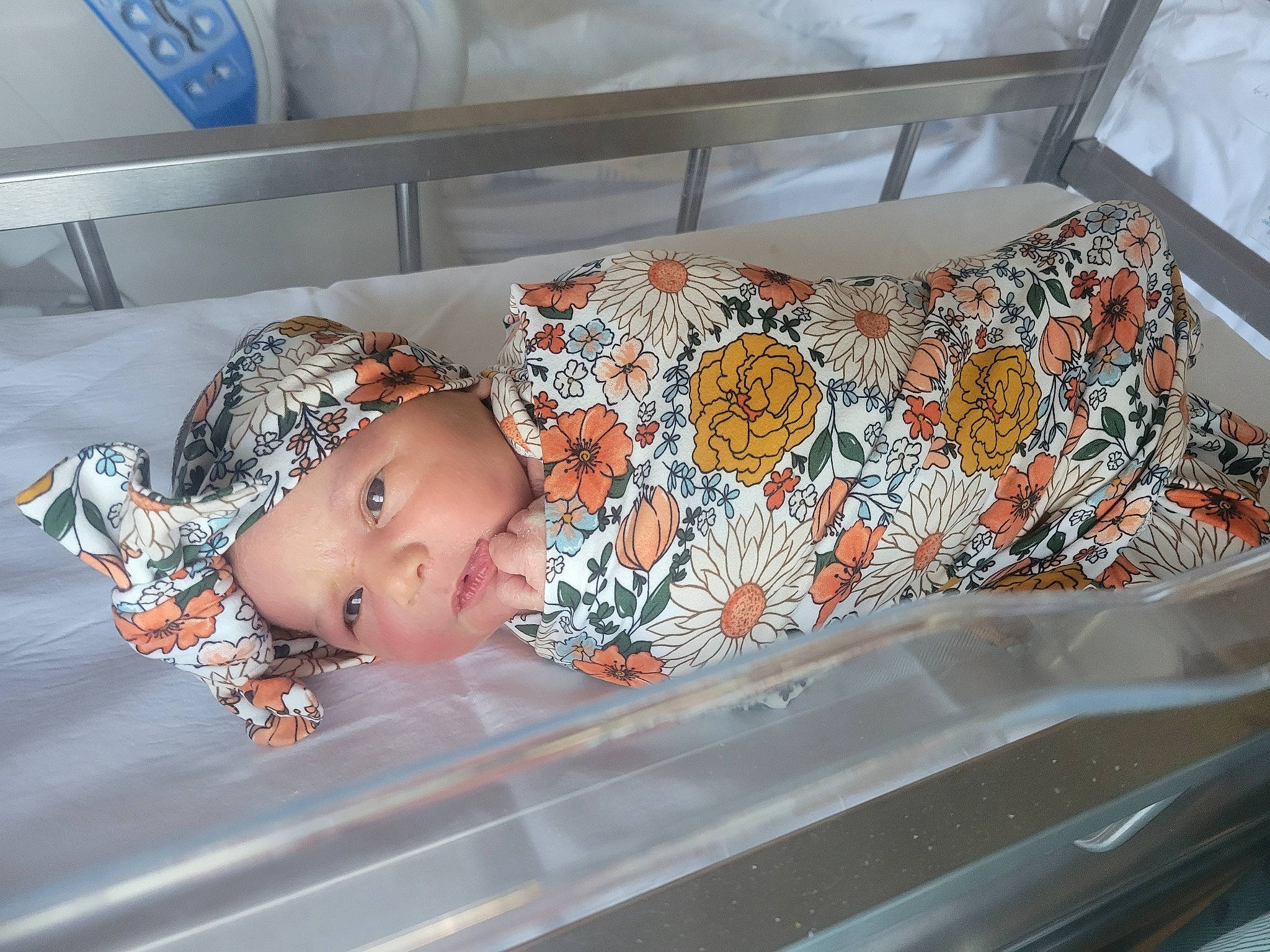 Cora joined the competition — help win amazing prizes! baby, baby_products, baby_toddler_clothing, child, comfort, hat, headwear, pattern, person, room, toddler