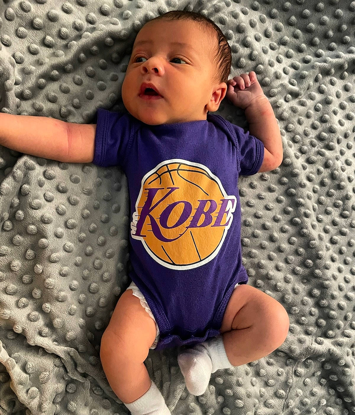 Cash joined the competition — help win amazing prizes! arm, baby, baby_toddler_clothing, cheek, child, cool, face, finger, gesture, happy, human_body, infant_bodysuit, mammal, nose, person, skin, sleeve, t_shirt, thigh, thumb