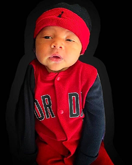 Cash is registered to the contest to win money with this photo: baby, baby_toddler_clothing, beanie, cap, carmine, cheek, flash_photography, fur, headgear, headwear, hood, hoodie, jacket, jersey, lip, magenta, outerwear, person, pink, sleeve