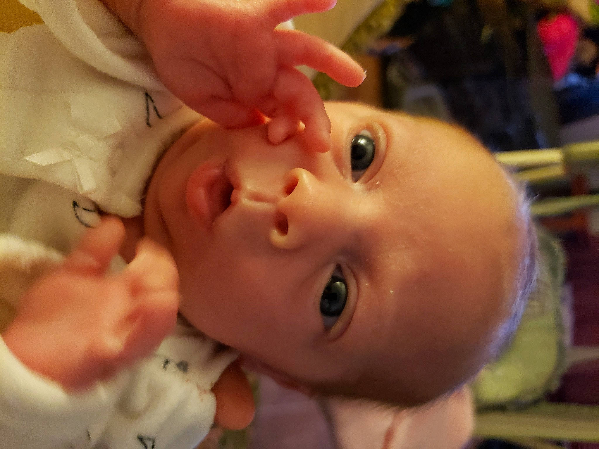 Sophie Jo is registered to the contest to win money with this photo: baby, cheek, child, chin, close_up, ear, eye, eyebrow, face, finger, forehead, hand, head, iris, lip, mouth, nose, organ, person, skin