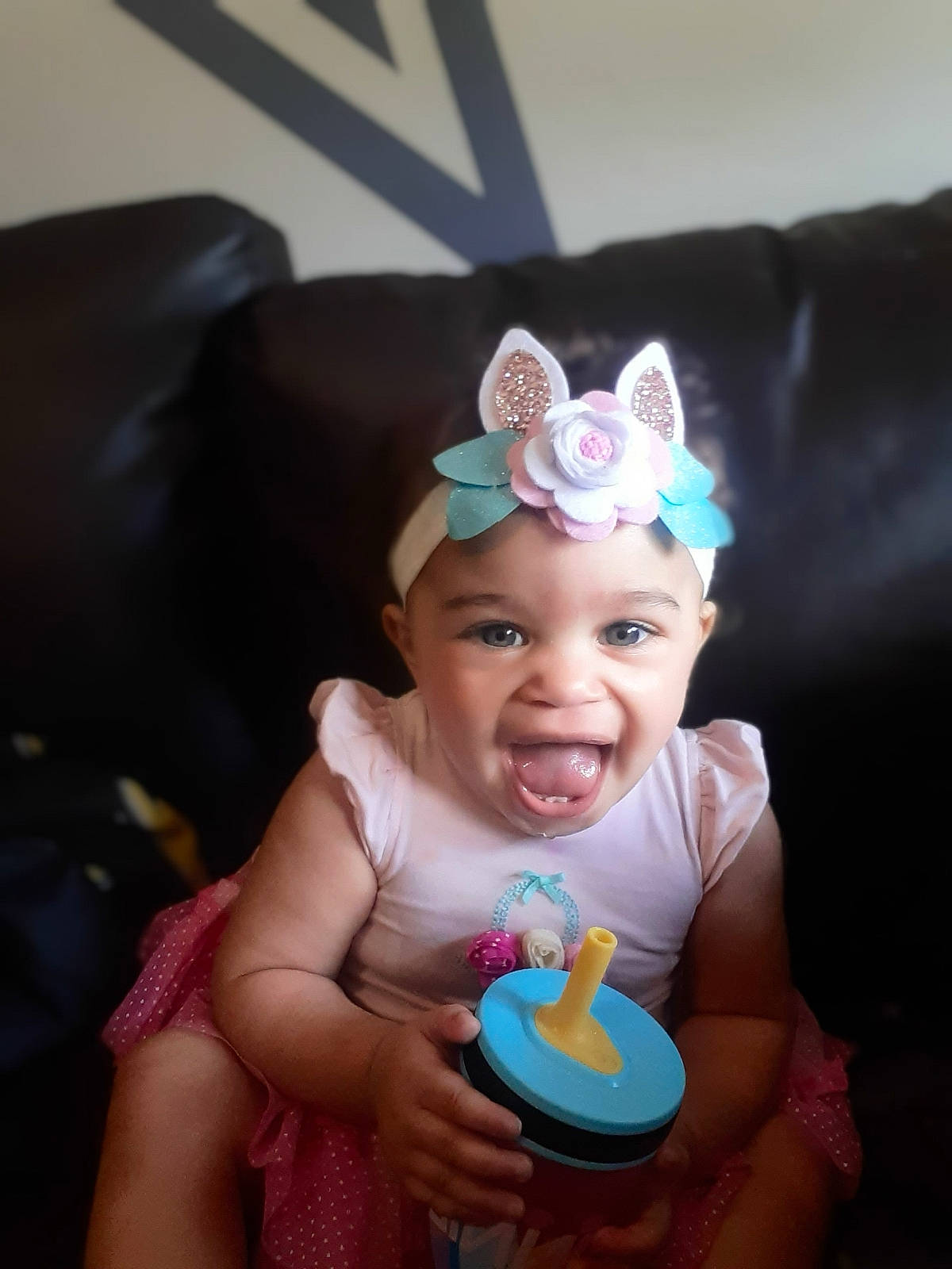 Lilyana joined the competition — help win amazing prizes! baby, birthday, birthday_cake, buttercream, cake, child, ear, food, hair_accessory, headgear, headpiece, headwear, icing, neck, party, party_hat, party_supply, person, pink, sweetness