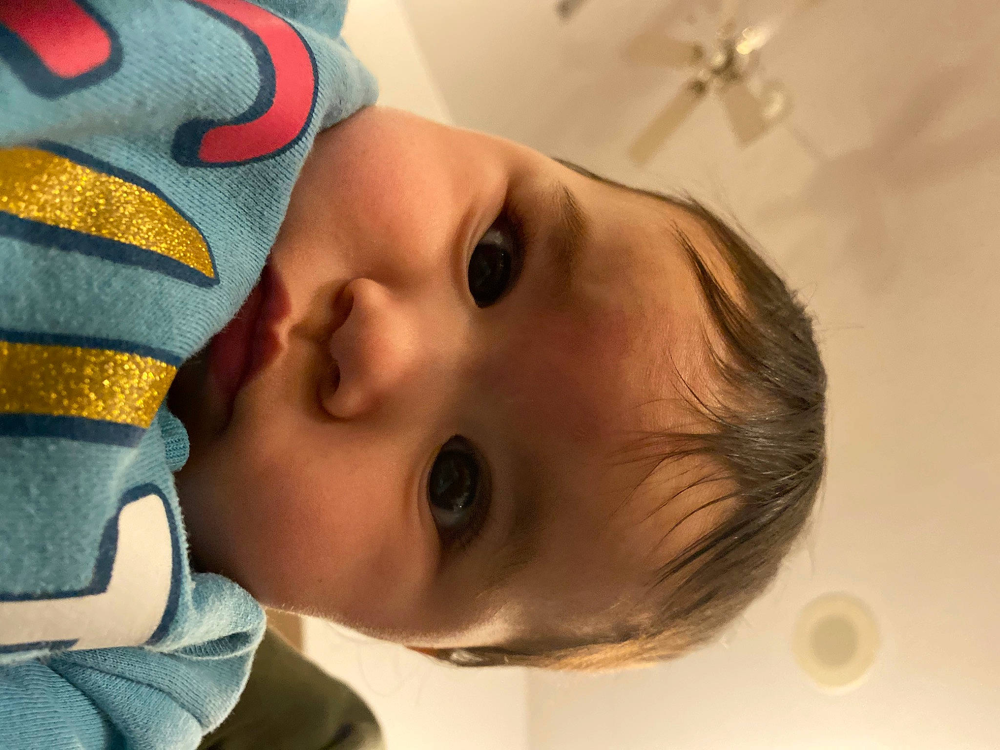 Camilla is registered to the contest to win money with this photo: baby, baby_toddler_clothing, cap, cheek, chin, eye, eyebrow, eyelash, face, facial_expression, forehead, head, human_body, iris, lip, mammal, mouth, neck, nose, person
