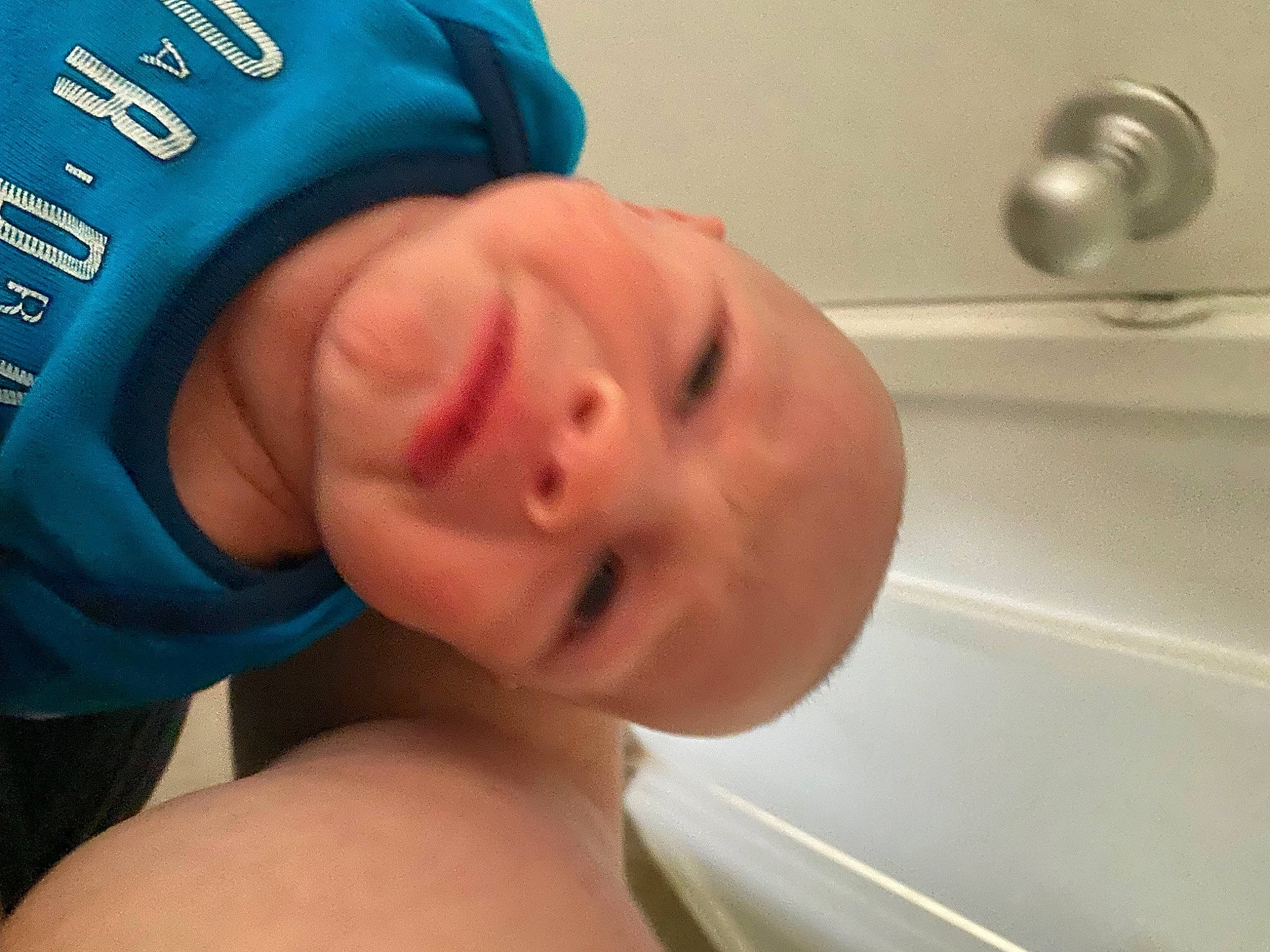 Bodhi joined the competition — help win amazing prizes! baby, baby_products, baseball_cap, bathing, cap, chest, child, comfort, elbow, electric_blue, eyelash, headgear, helmet, muscle, nose, person, personal_protective_equipment, skin, sleeve, sorrow