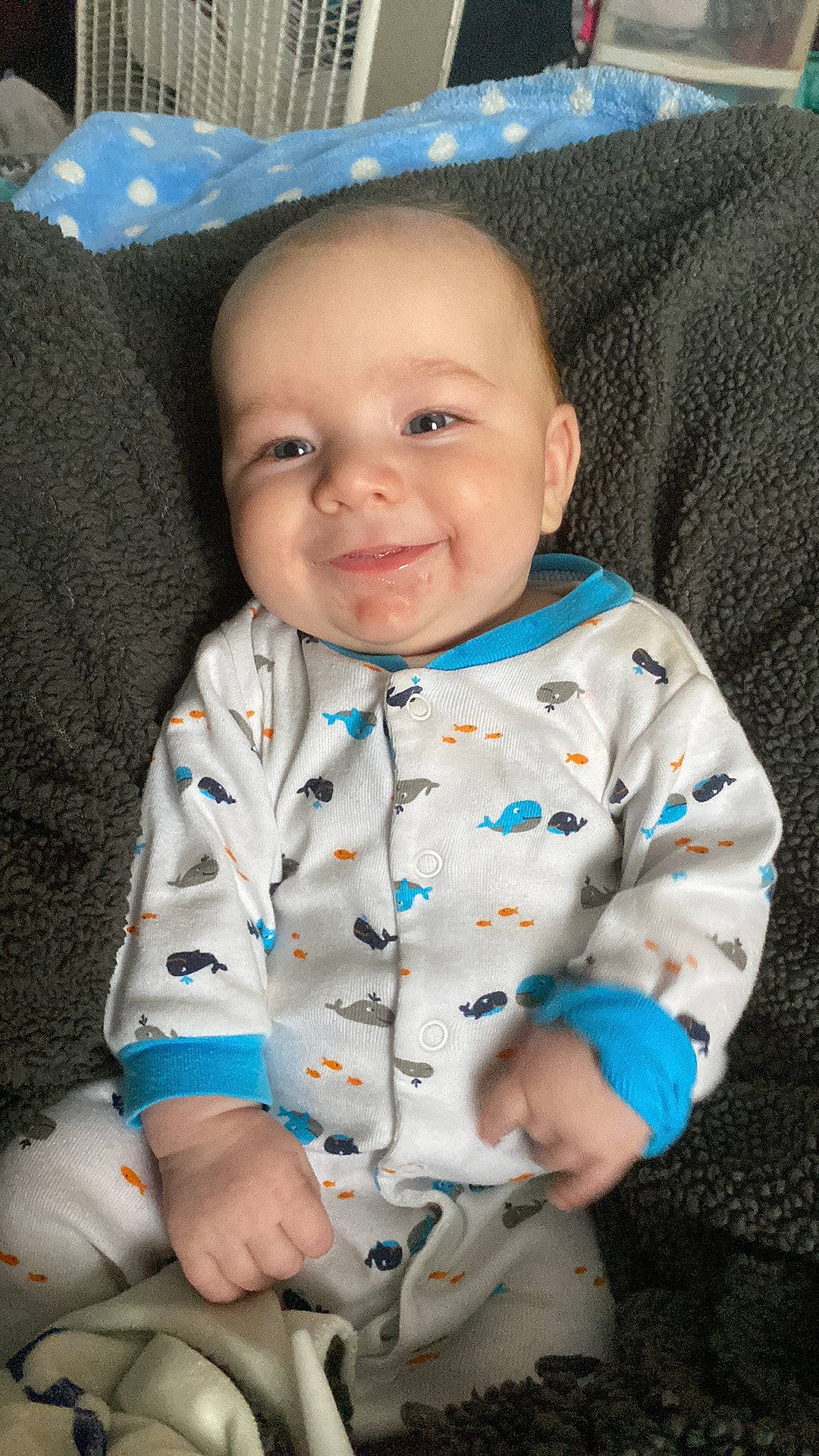 Brennex is registered to the contest to win money with this photo: baby, baby_toddler_clothing, cheek, child, chin, collar, comfort, eye, happy, head, iris, joy, linens, nose, person, product, sitting, skin, sleeve, smile