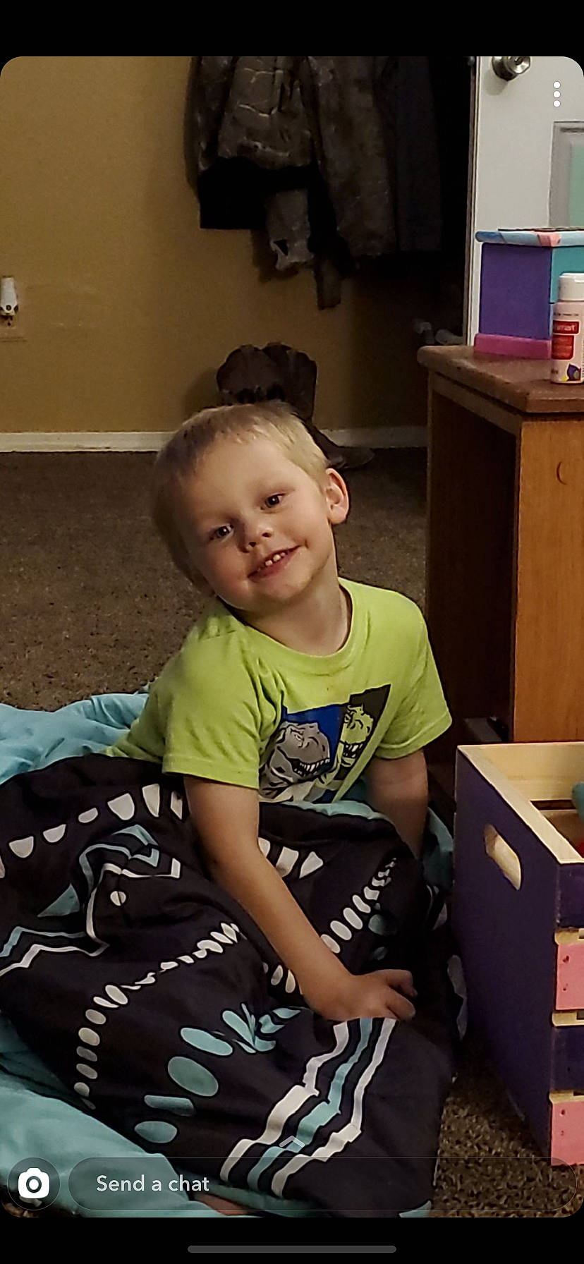 Ashton joined the competition — help win amazing prizes! arm, child, furniture, joy, leg, person, sitting, smile, t_shirt, toddler