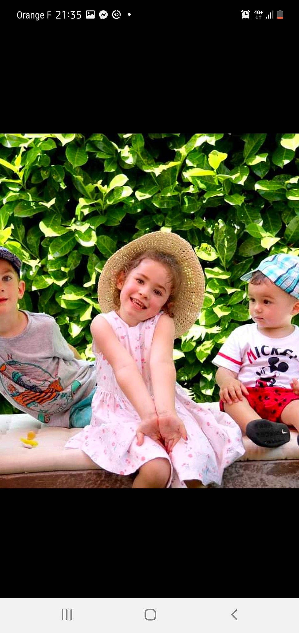 Lena participe au concours pour gagner de l'argent avec cette photo : baby_toddler_clothing, botany, face, facial_expression, flash_photography, grass, happy, hat, head, headgear, headwear, joy, leaf, leisure, nature, people_in_nature, person, photograph, pink, plant