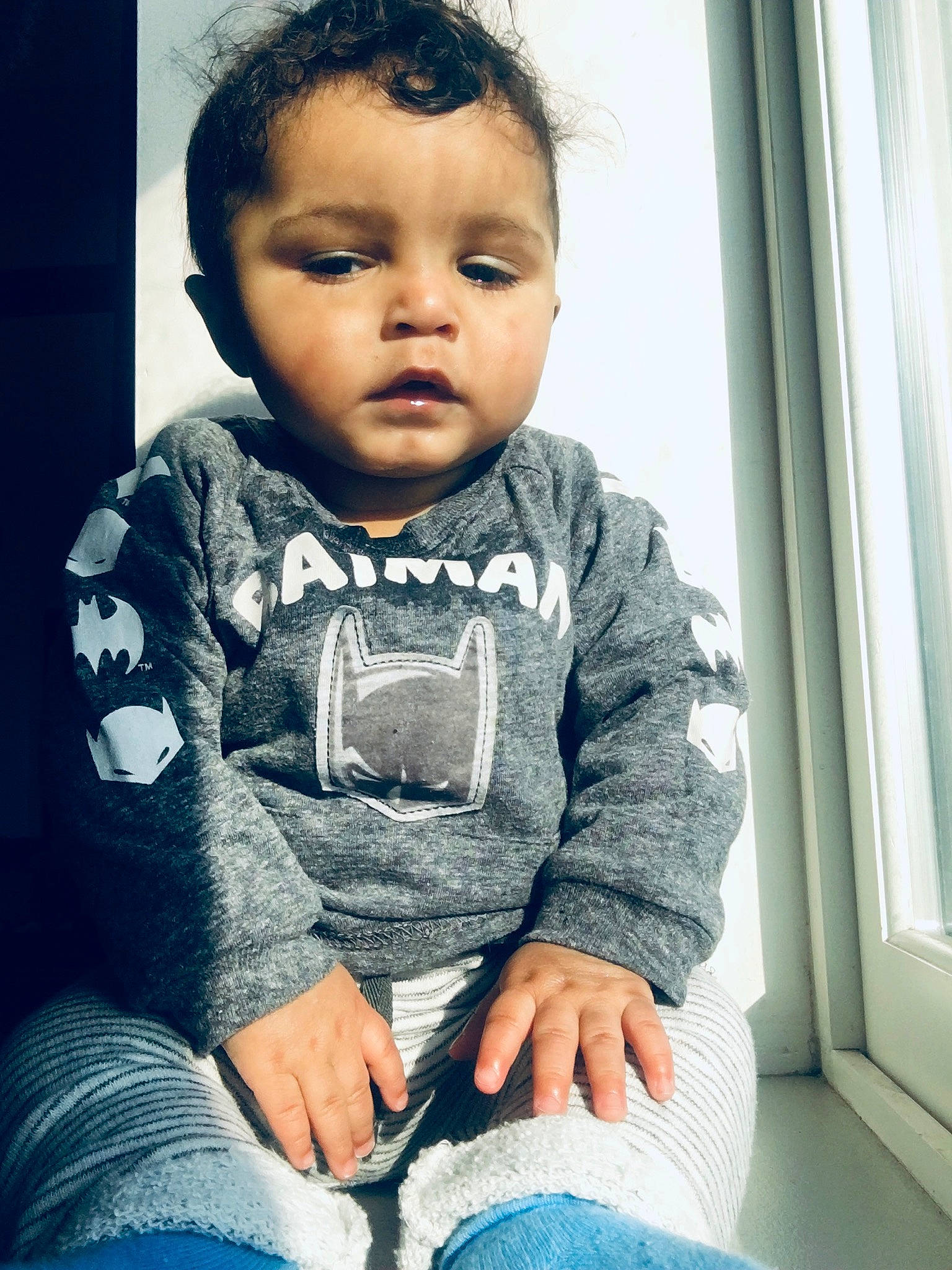 Mikah joined the competition — help win amazing prizes! baby, cheek, child, chin, cool, eye, eyebrow, face, forehead, hair, hairstyle, head, jeans, lip, nose, outerwear, person, sitting, skin, smile