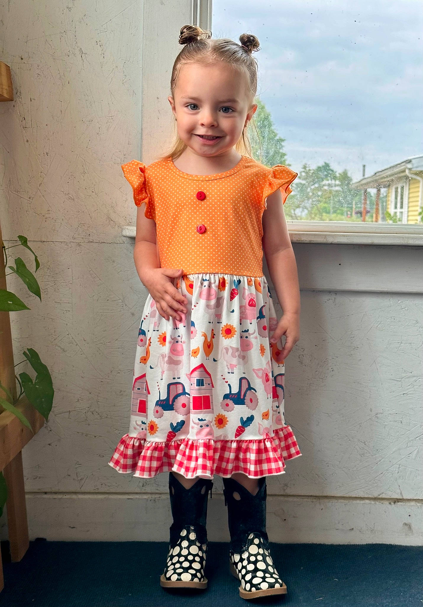 Andi is registered to the contest to win money with this photo: baby_toddler_clothing, child, day_dress, dress, electric_blue, fun, happy, human_body, joy, magenta, one_piece_garment, pattern, person, pink, plant, sky, sleeve, smile, standing, toddler