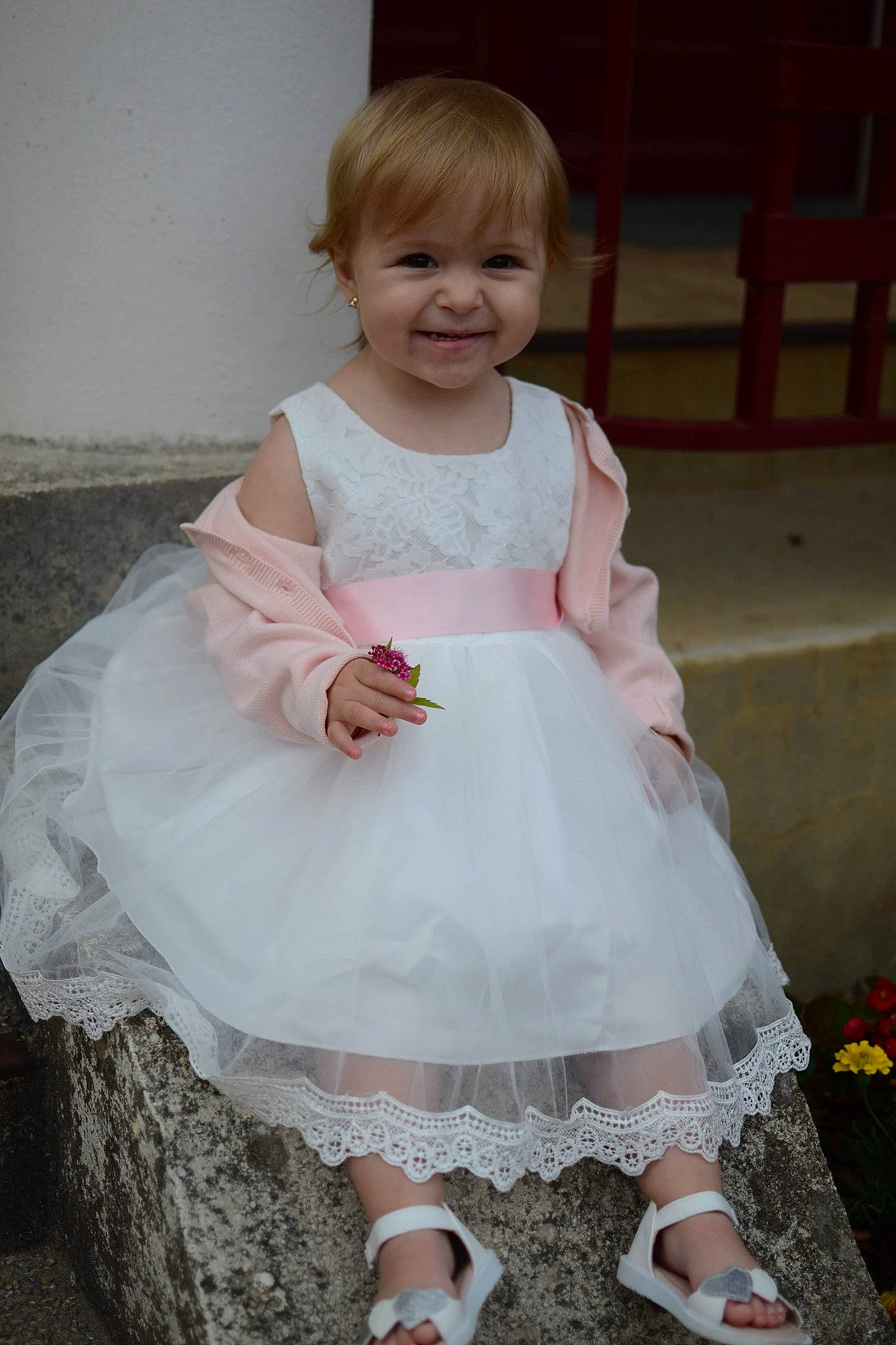 Maëlyne participe au concours pour gagner de l'argent avec cette photo : baby, baby_toddler_clothing, ceremony, child, clothing, costume, dress, joy, person, pink, product, skin, smile, toddler, white