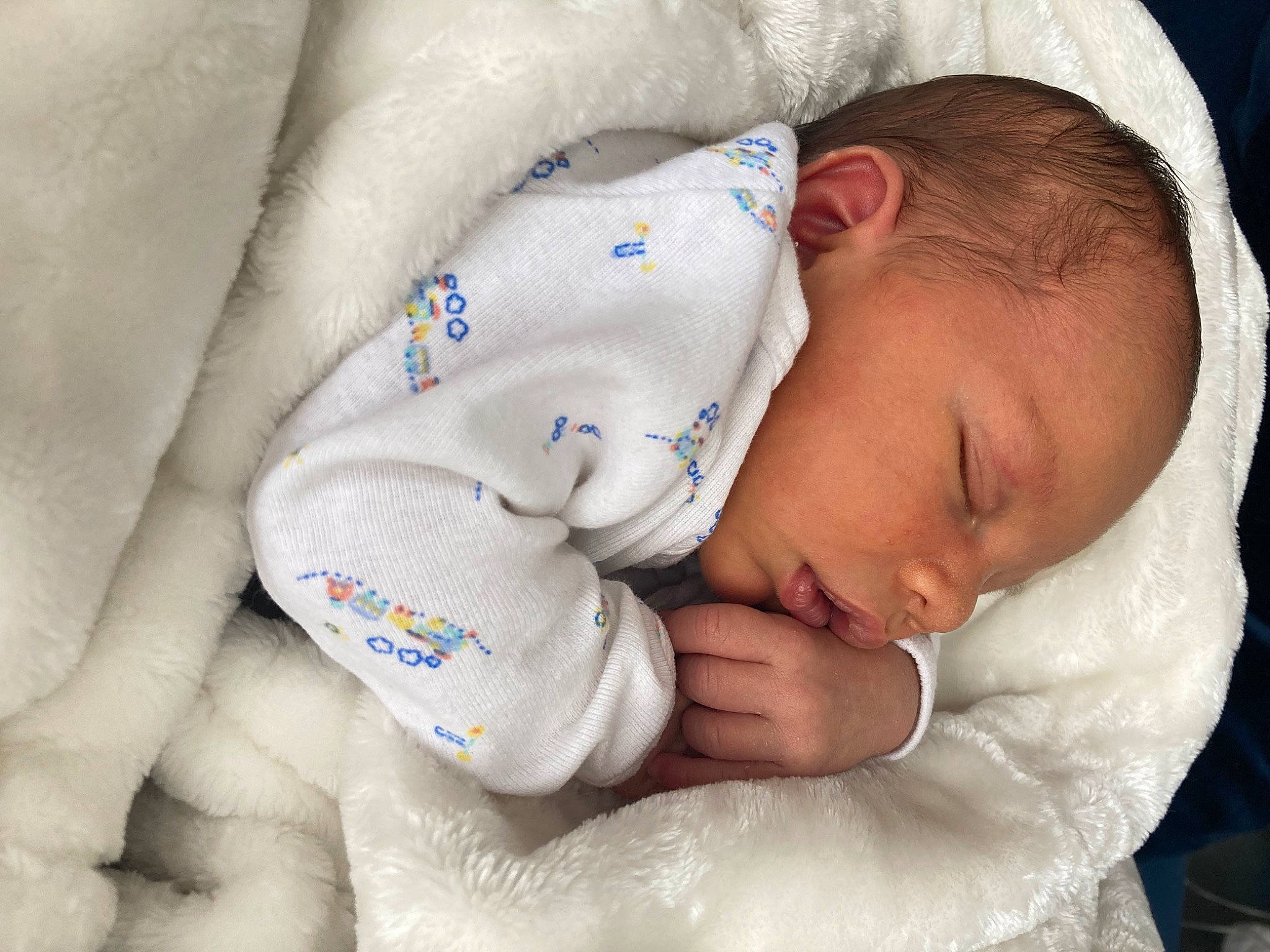 Evander joined the competition — help win amazing prizes! arm, azure, baby, baby_products, baby_sleeping, baby_toddler_clothing, cheek, child, comfort, facial_expression, finger, gesture, hand, linens, mammal, nose, person, skin, textile, toddler