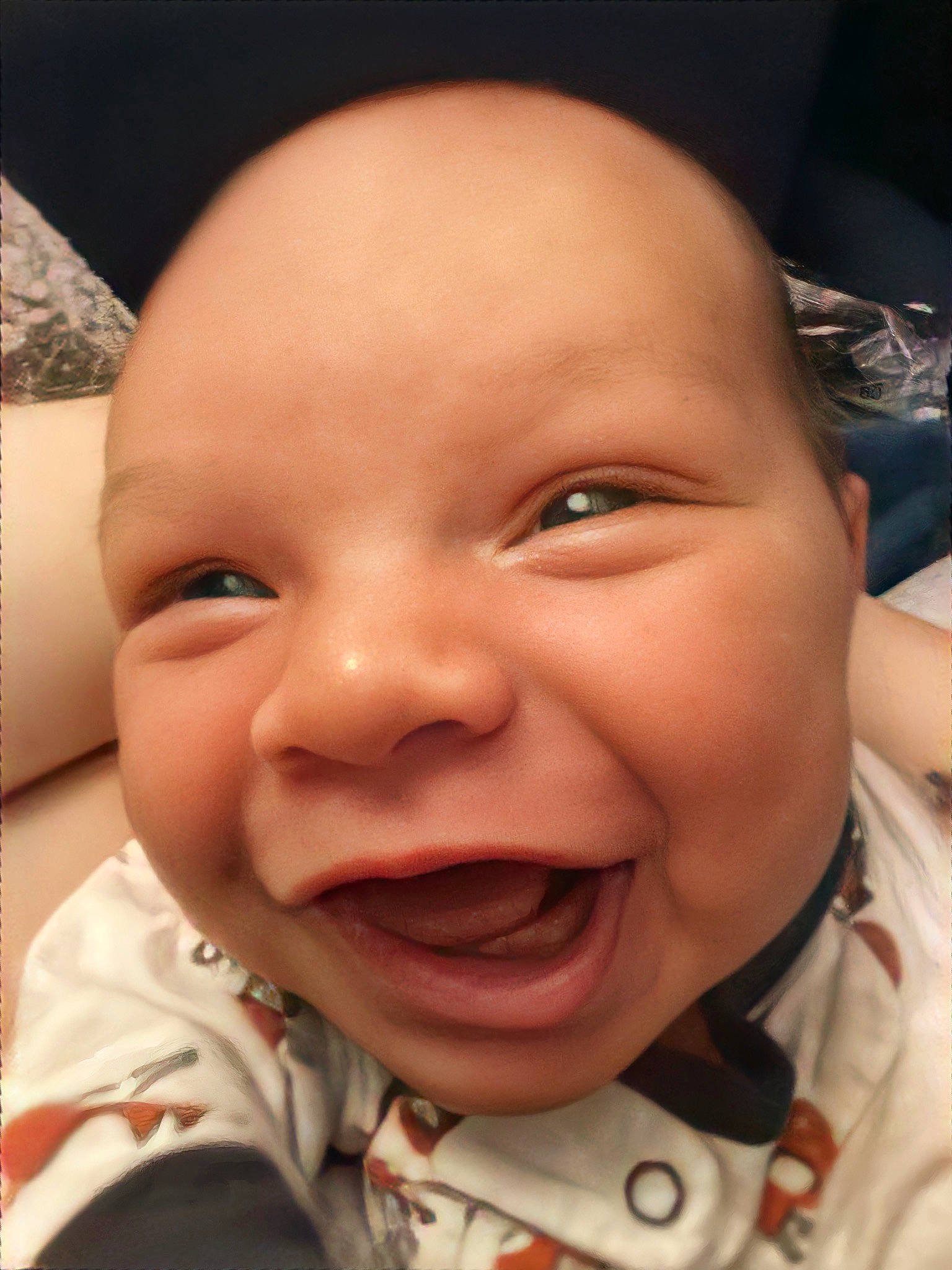 Evander is registered to the contest to win money with this photo: baby, cheek, chin, ear, eye, eyebrow, eyelash, forehead, happy, head, iris, jaw, lip, mouth, neck, nose, person, skin, smile, tongue