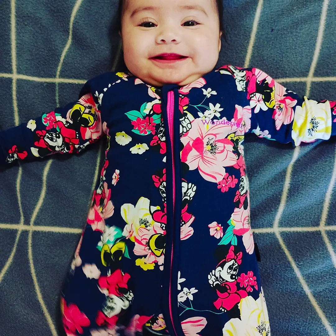 Alriyah joined the competition — help win amazing prizes! baby, baby_products, baby_toddler_clothing, child, collar, happy, headwear, joy, magenta, outerwear, pattern, peach, person, pink, product, sleeve, smile, t_shirt, toddler, top