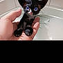Miaumiau joined the competition — help win amazing prizes! kitten, cat, hand, blue_eyes, black_and_white, tiny, cute, pet, feline, whiskers, indoor, bathroom, sink, close_up, portrait, animal, domestic_animal, young, small, looking_up