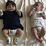 Santana And Juelz joined the competition — help win amazing prizes! baby, bed, blanket, bodypart, clothing, diaper, face, finger, furniture, glove, hand, head, hosiery, newborn, person, photography, portrait, shorts, sleeping, sock