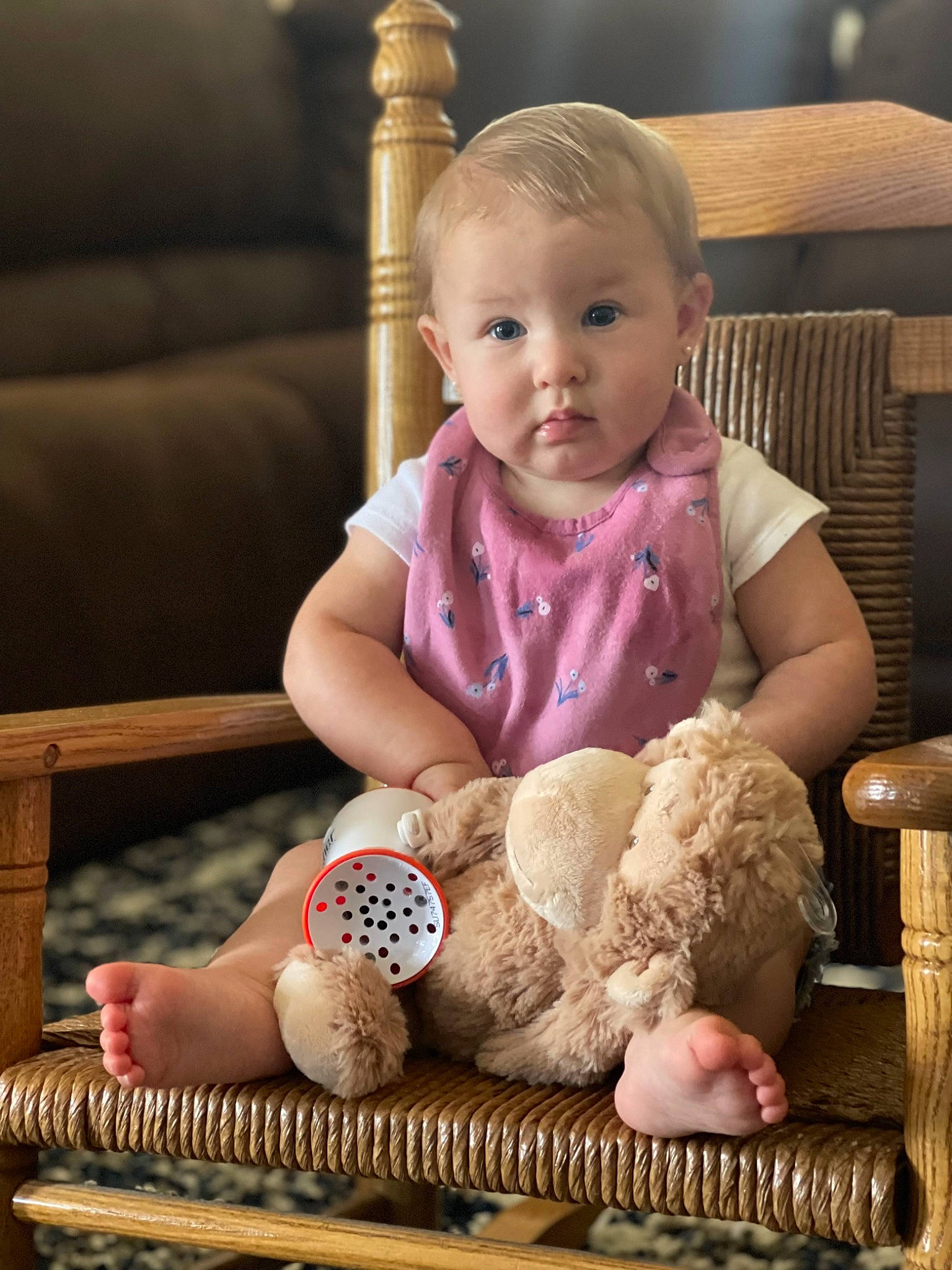 Olivia joined the competition — help win amazing prizes! baby, baby_safety, baby_toddler_clothing, cheek, child, comfort, face, facial_expression, head, human_body, infant_bed, pattern, person, pink, sitting, skin, sleeve, sock, toddler, toy