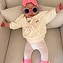 Veroccilia a rejoint le concours — aidez-le/la à gagner de superbes lots ! baby, child, sunglasses, headband, pink, socks, unicorn, sweatshirt, leggings, couch, pillows, cozy, cute, fashion, indoor, smiling, relaxed, person, infant, comfortable