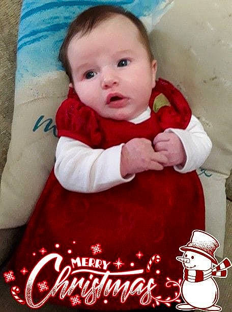 Melinda is registered to the contest to win money with this photo: cheek, child, christmas, day, happiness, infant, person, photo_caption, product, red, smile, toddler