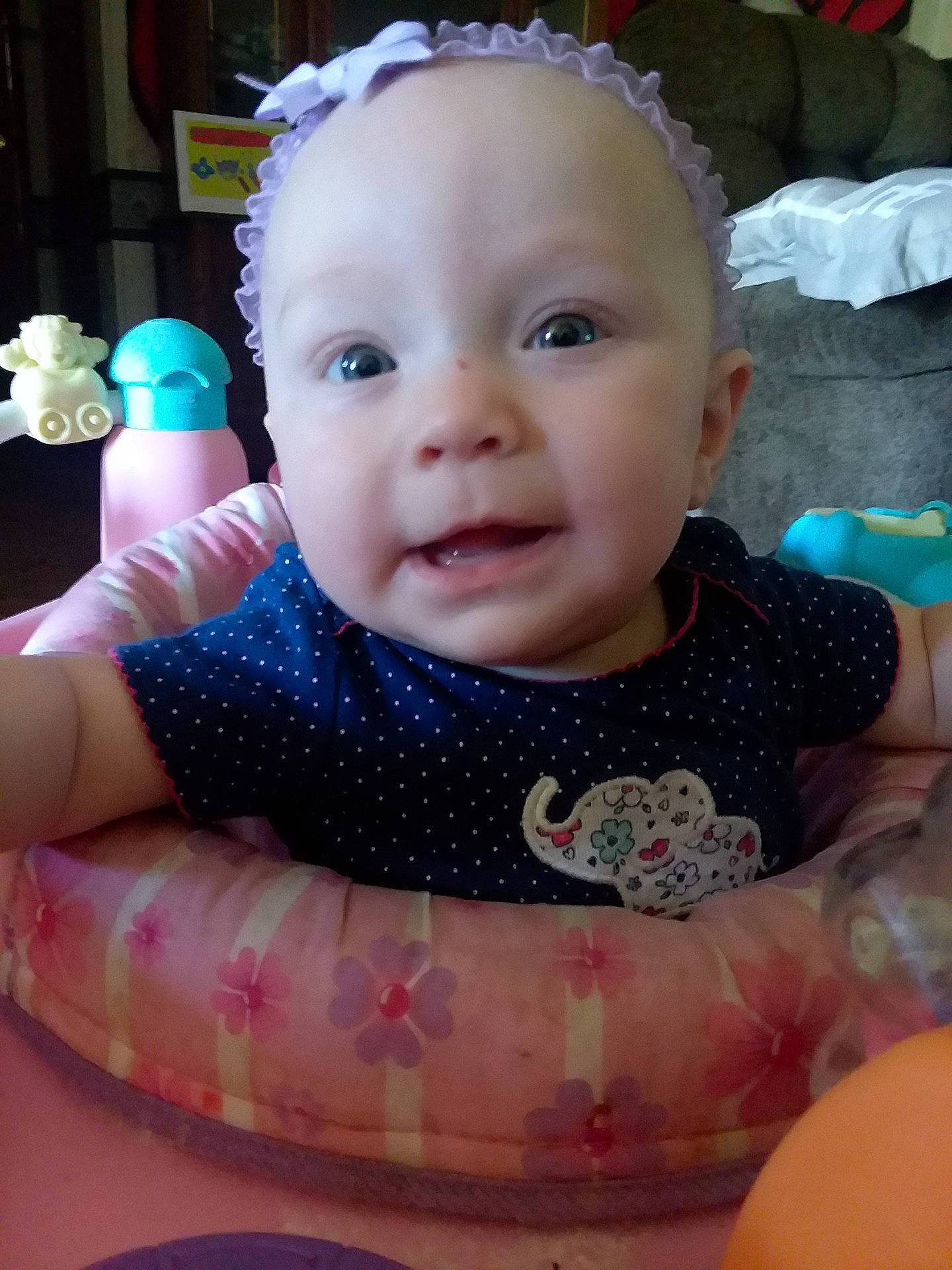 Jaeden is registered to the contest to win money with this photo: child, clothing, day, dress, eye, facial_expression, girl, infant, organ, person, skin, smile, sweetness, toddler