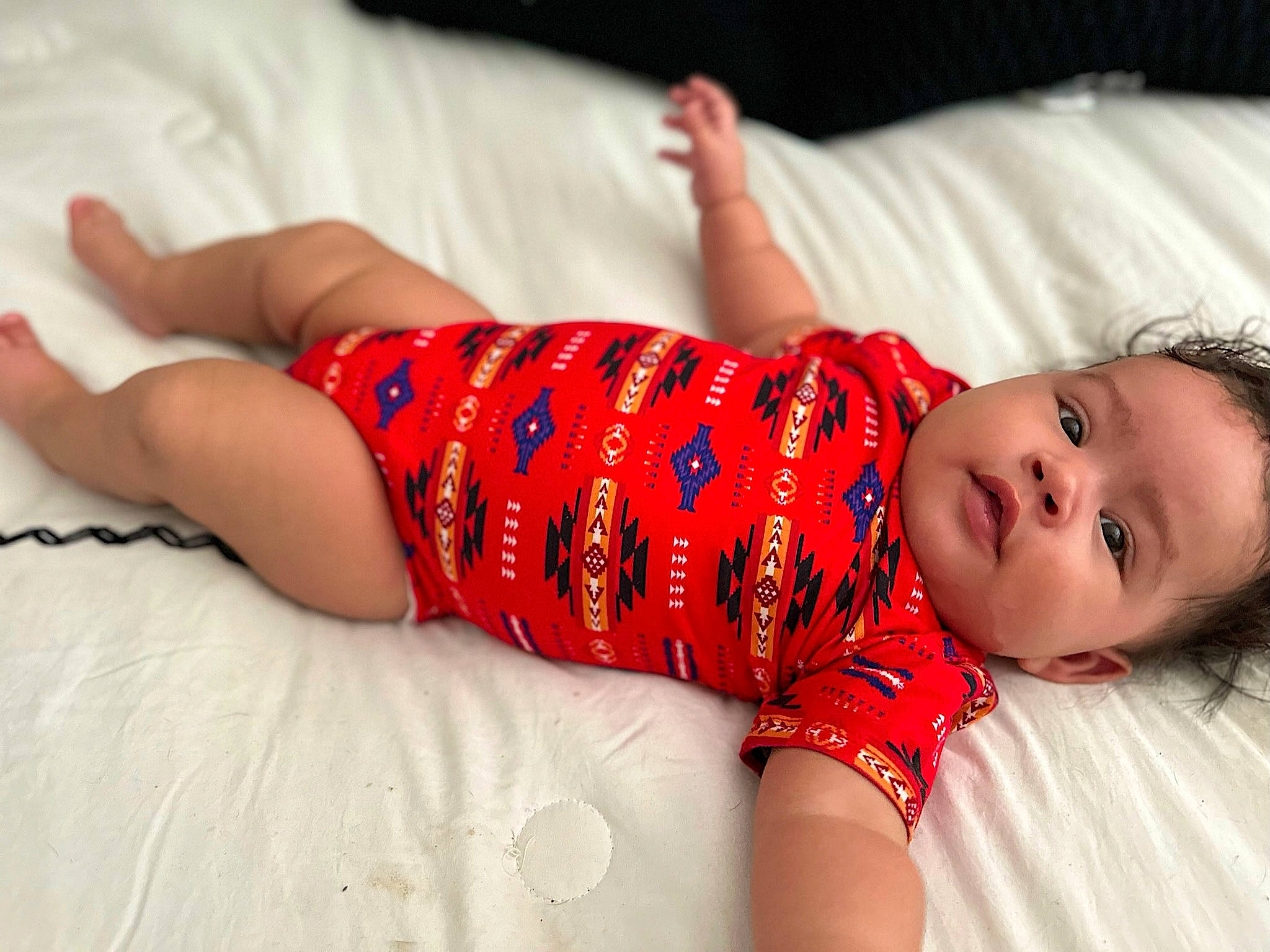 Emersyn is registered to the contest to win money with this photo: arm, baby, baby_toddler_clothing, comfort, couch, elbow, facial_expression, finger, flash_photography, human_body, joint, leg, lip, mouth, person, product, skin, sleeve, smile, textile