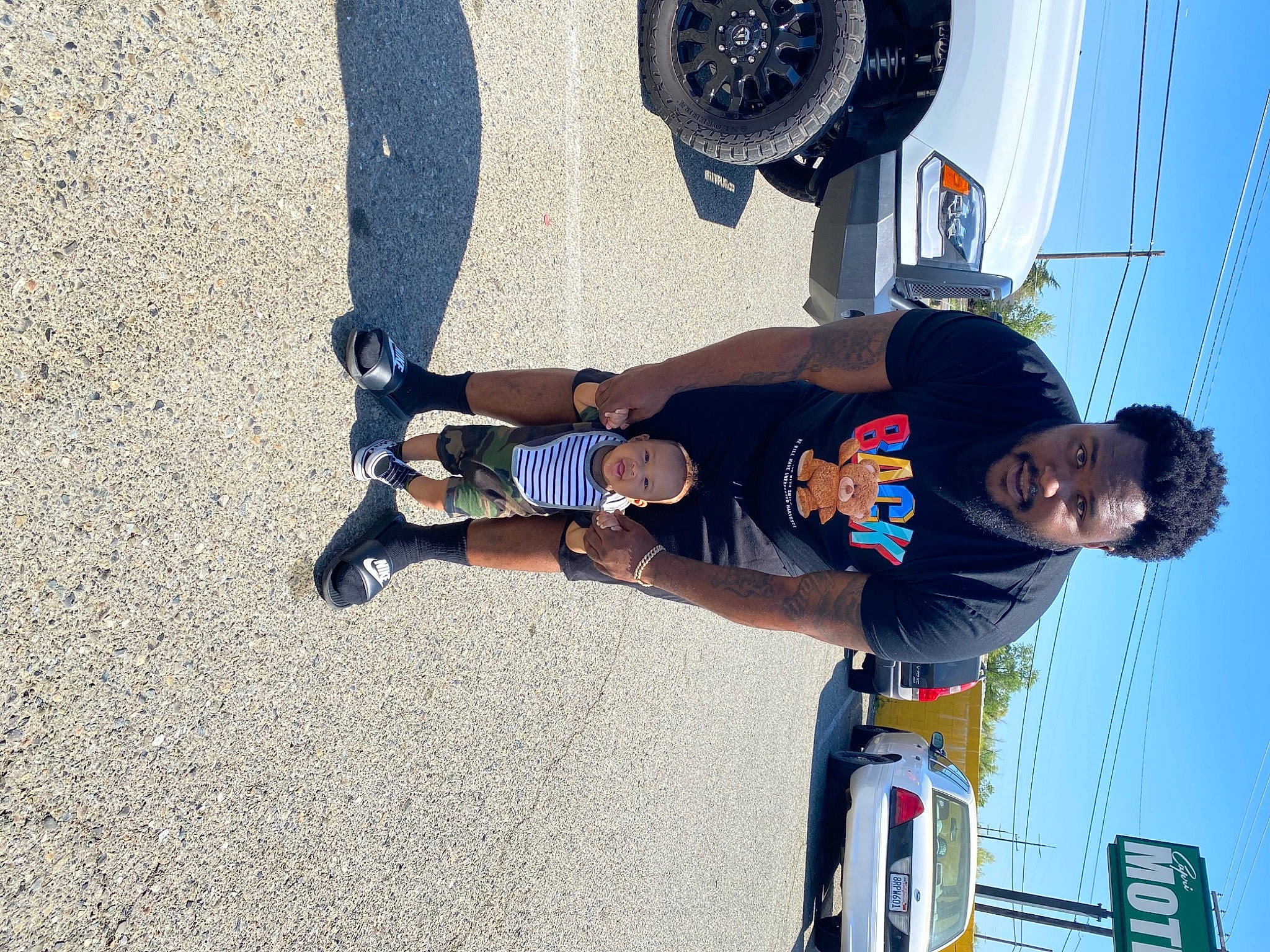 Tru joined the competition — help win amazing prizes! asphalt, automotive_tire, boot, electric_blue, fun, hat, human_leg, knee, outdoor_shoe, person, recreation, shorts, sky, sneakers, sports, sports_equipment, sports_uniform, t_shirt, tire, walking_shoe