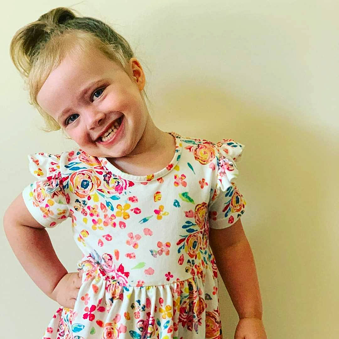 Macie joined the competition — help win amazing prizes! baby_toddler_clothing, blouse, child, child_model, clothing, design, dress, ear, joint, joy, neck, pattern, person, shoulder, sleeve, smile, t_shirt, toddler, top
