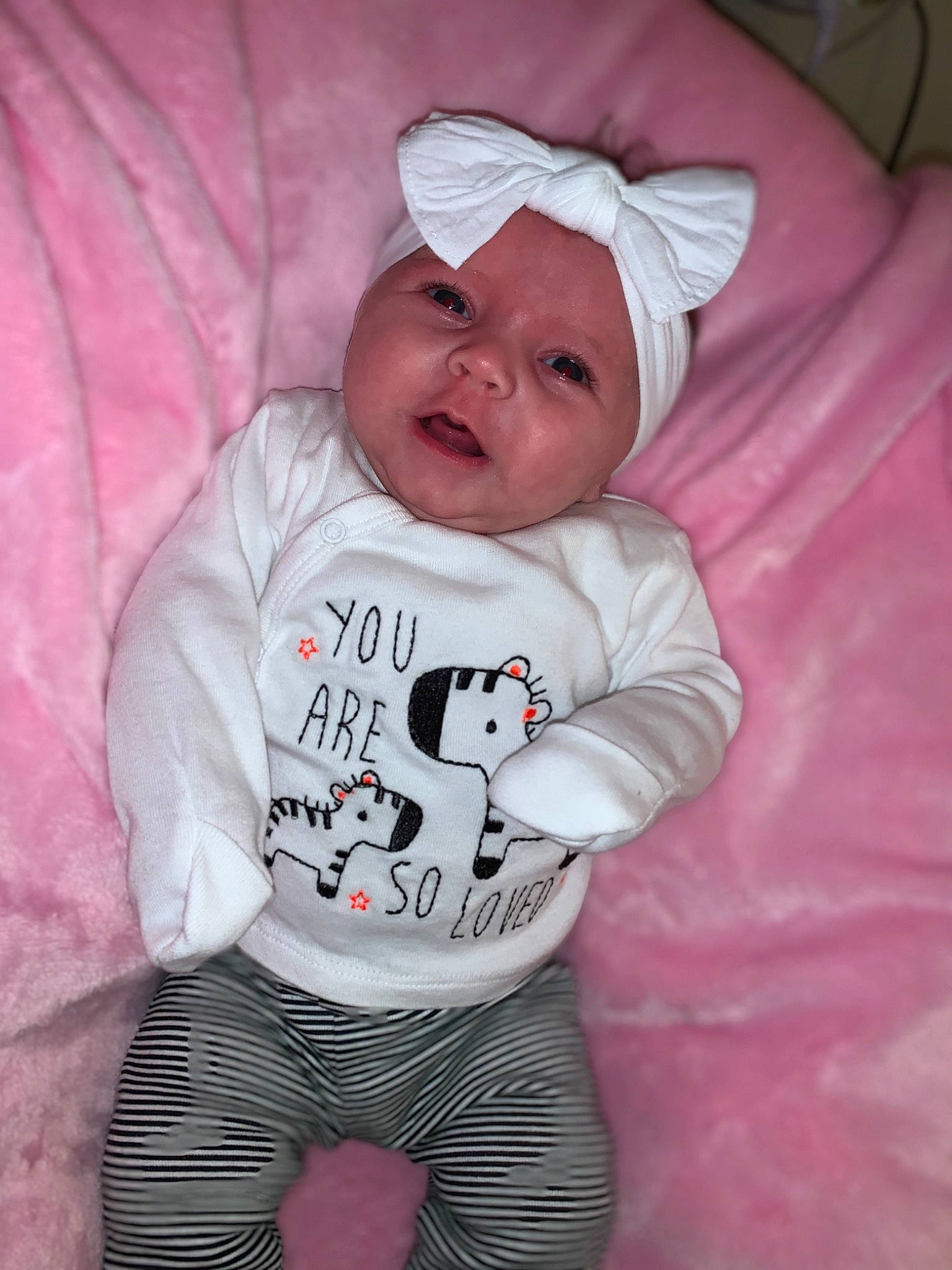 Bryleigh is registered to the contest to win money with this photo: active_pants, baby, baby_products, baby_toddler_clothing, bonnet, cheek, child, costume_accessory, headwear, hood, leggings, long_sleeved_t_shirt, nightwear, pajamas, person, pink, sleeve, sweatpant, tights, toddler