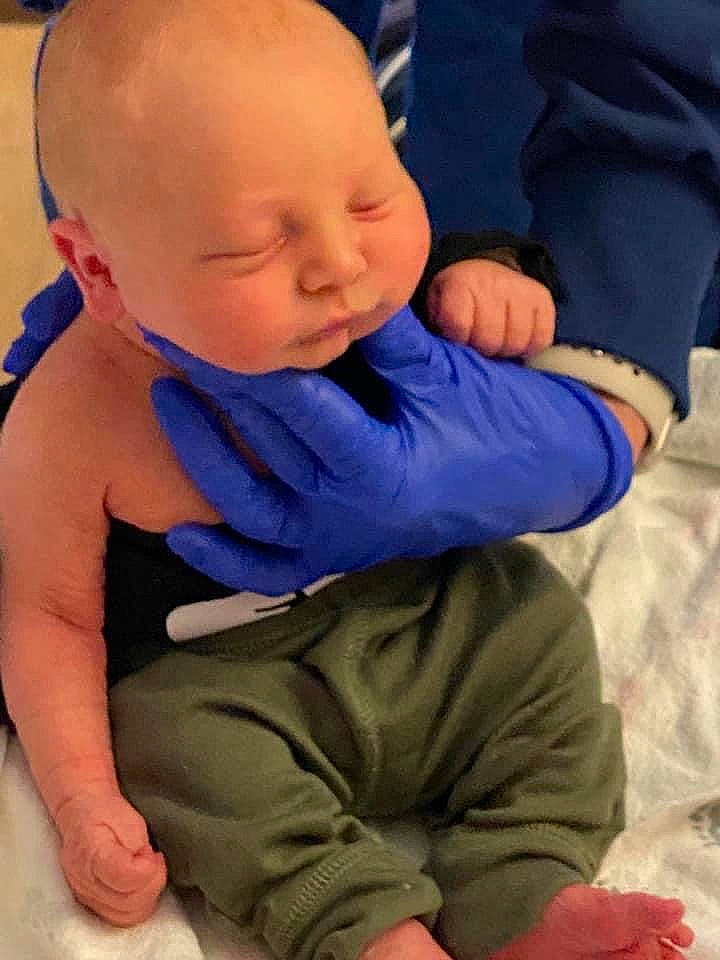 Beaux is registered to the contest to win money with this photo: arm, baby, baby_toddler_clothing, cheek, comfort, eye, finger, gesture, hand, happy, human, human_body, joint, mouth, nose, person, product, skin, sleeve, thumb