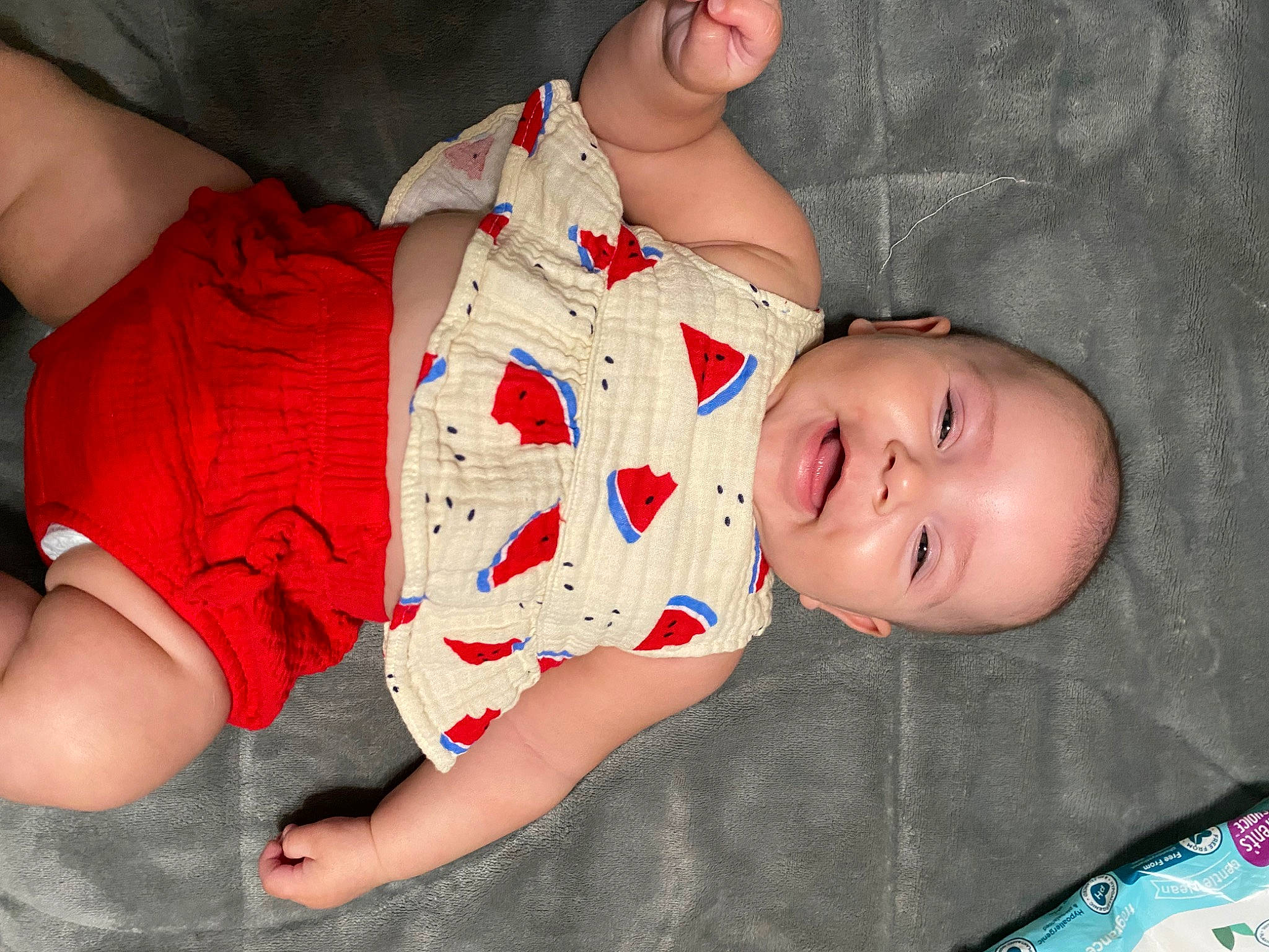 Mercy is registered to the contest to win money with this photo: abdomen, baby, baby_toddler_clothing, chest, dress, elbow, finger, happy, human_body, mouth, people, person, skin, sleeve, smile, stomach, textile, thigh, toddler, trunk