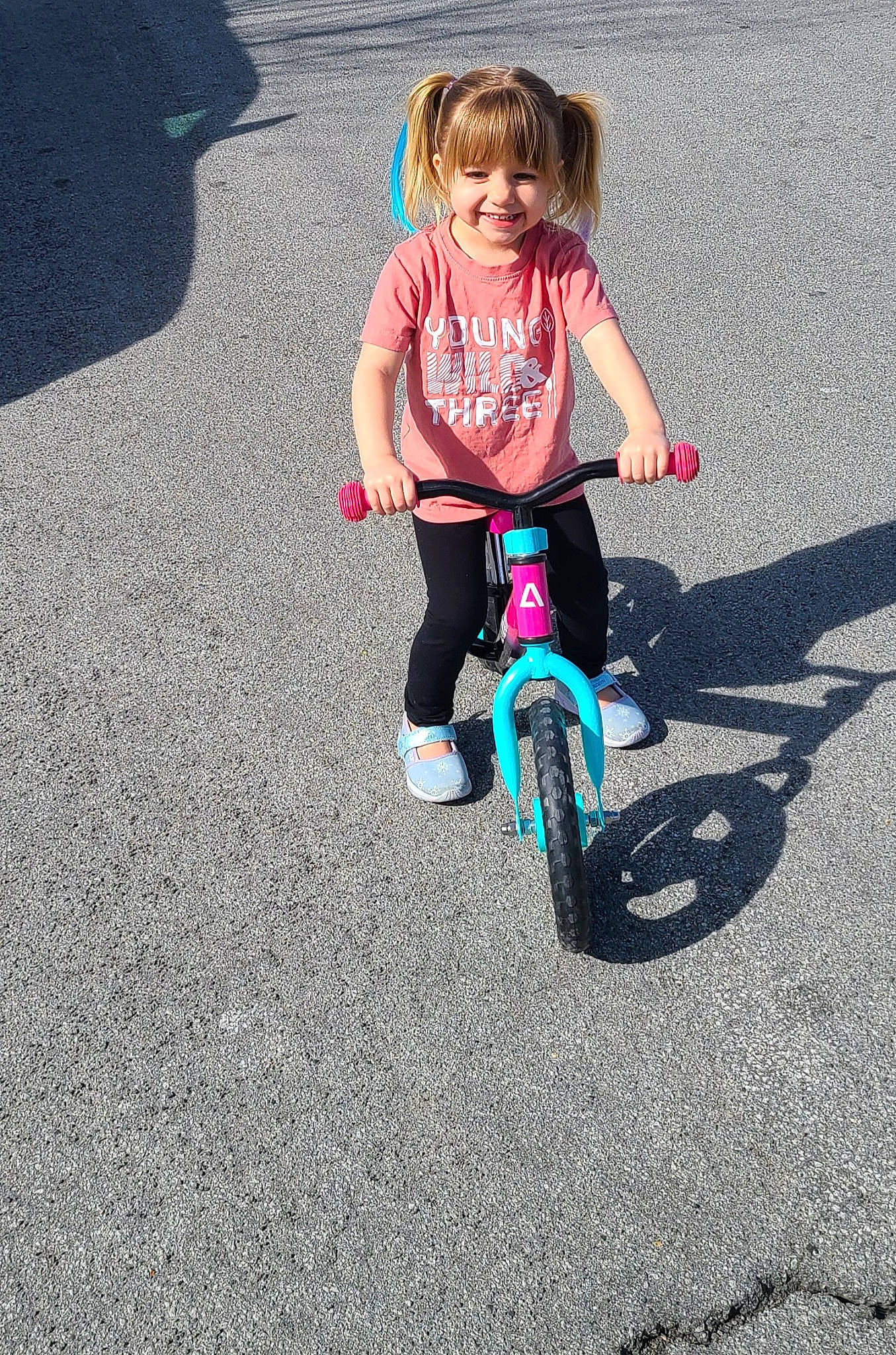 Charlee is registered to the contest to win money with this photo: asphalt, automotive_tire, automotive_wheel_system, bicycle, bicycle_accessory, bicycle_frame, bicycle_handlebar, bicycle_tire, bicycle_wheel, bicycles_equipment_and_supplies, joy, leg, leisure, people_in_nature, person, recreation, road_surface, rolling, spoke, tire