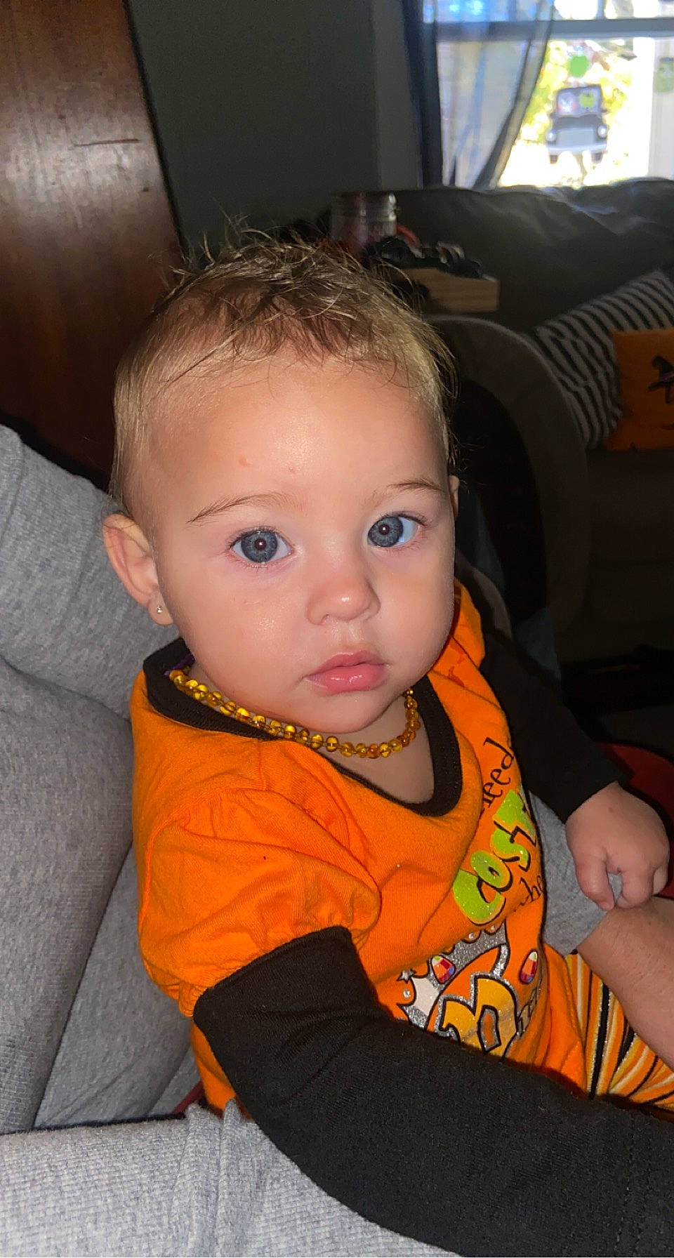 Hadley joined the competition — help win amazing prizes! baby, baby_toddler_clothing, car_seat, chair, cheek, child, chin, comfort, eyebrow, flooring, fun, iris, mouth, nail, nose, orange, person, sitting, sleeve, t_shirt