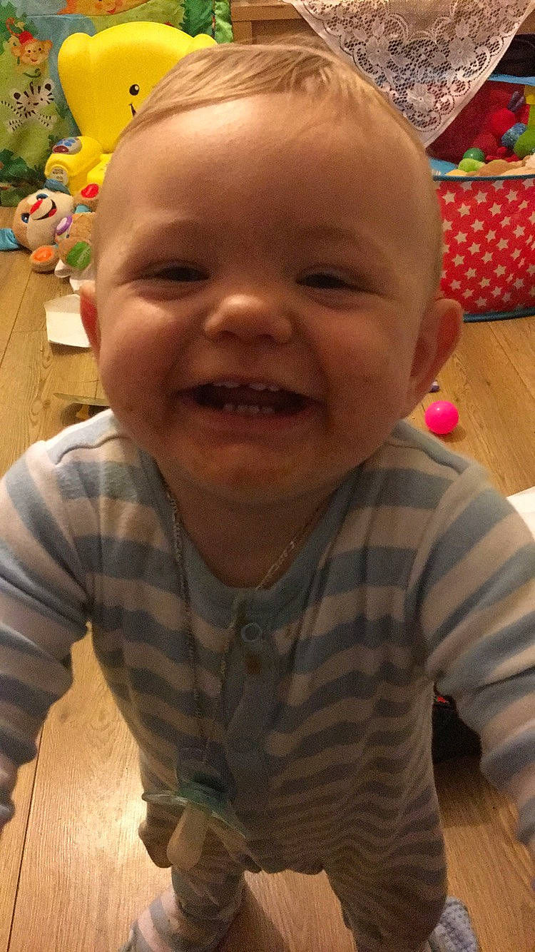 Georgie is registered to the contest to win money with this photo: boy, cheek, child, cool, day, ear, emotion, eye, face, facial_expression, head, infant, joy, mouth, nose, organ, person, play, product, skin