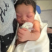 Aariellà joined the competition — help win amazing prizes! newborn, baby, sleeping, blanket, hospital, medical, tube, hand, clothing, person, closeup, indoor, resting, cute, infant, skin, face, hair, comfort, care