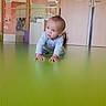 Kameron participe au concours pour gagner de l'argent avec cette photo : baby, backpack, bracelet, child, crawling, curious_expression, eyes, floor_texture, glass_partition, green_floor, hands, indoor, long_sleeves, looking_up, overalls, papers_on_wall, playroom, portrait, toddler, wooden_door