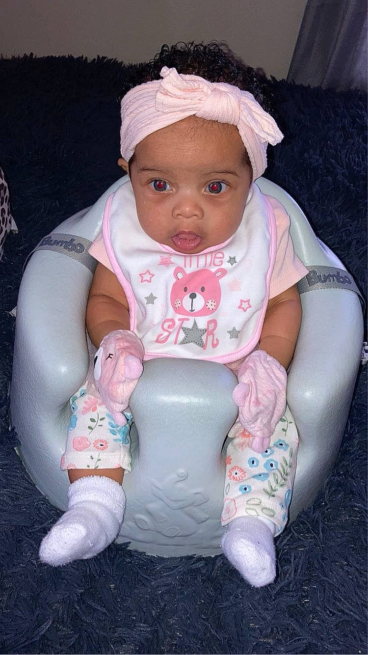 Zyra joined the competition — help win amazing prizes! baby, baby_carriage, baby_toddler_clothing, beauty, bib, cheek, child, eye, face, finger, fun, hand, head, headwear, organ, people, person, pink, product, skin