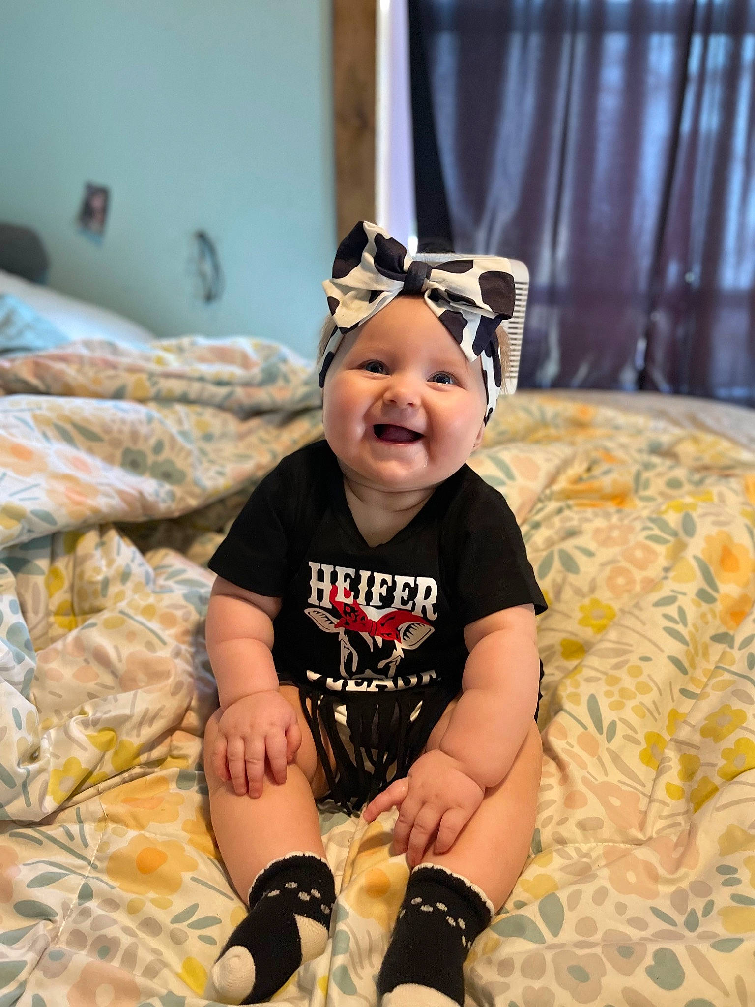 Hazel is registered to the contest to win money with this photo: baby, baby_toddler_clothing, child, costume_hat, curtain, event, eye, eyewear, fashion_accessory, flash_photography, fun, goggles, happy, hat, headwear, joy, pattern, person, personal_protective_equipment, sleeve