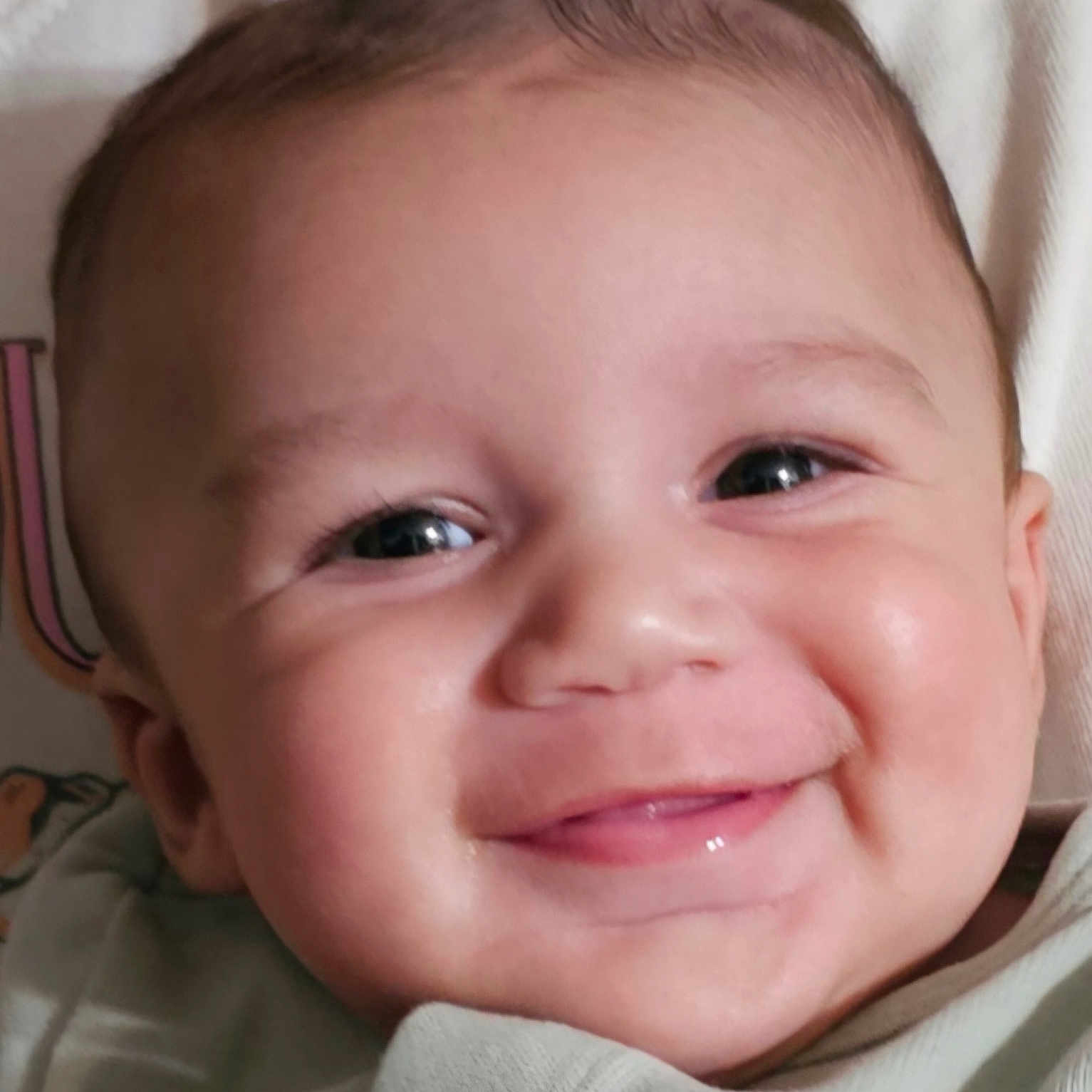 Marktwain joined the competition — help win amazing prizes! baby, smile, face, close_up, child, infant, cute, happy, eyes, skin, cheeks, clothing, blanket, portrait, adorable, young, expression, person, head, indoors