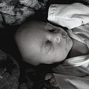 Riley joined the competition — help win amazing prizes! baby, sleeping, infant, black_and_white, soft, blanket, clothing, peaceful, portrait, closeup, newborn, face, cute, child, resting, cozy, tender, skin, head, hands