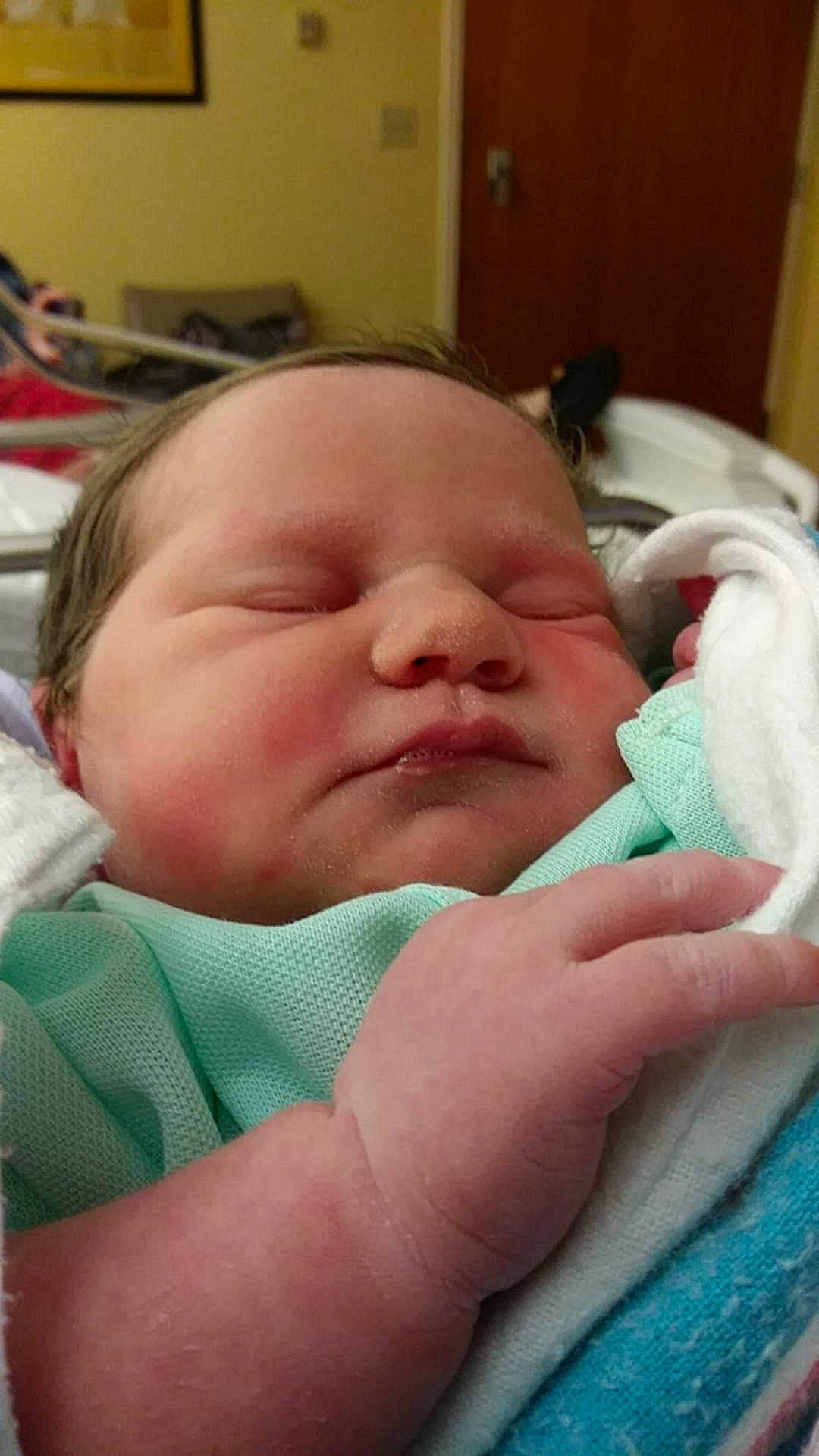 Kimberly joined the competition — help win amazing prizes! baby, baby_toddler_clothing, bedtime, cheek, child, close_up, comfort, ear, facial_expression, finger, iris, linens, mammal, mouth, nose, person, pink, skin, thumb, toddler