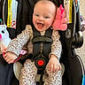 Athea joined the competition — help win amazing prizes! baby, child, car_seat, smiling, happy, plush_toy, stuffed_animal, safety_harness, infant, clothing, patterned_outfit, indoors, seat, cute, face, person, joy, comfort, toddler, young_child