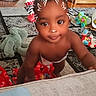 baby, basket, blanket, carpet, cat_ears, child, crawling, cute, diaper, filter, furniture, indoor, living_room, person, playful, smiling, soft_toy, toddler, toy, wood_floor