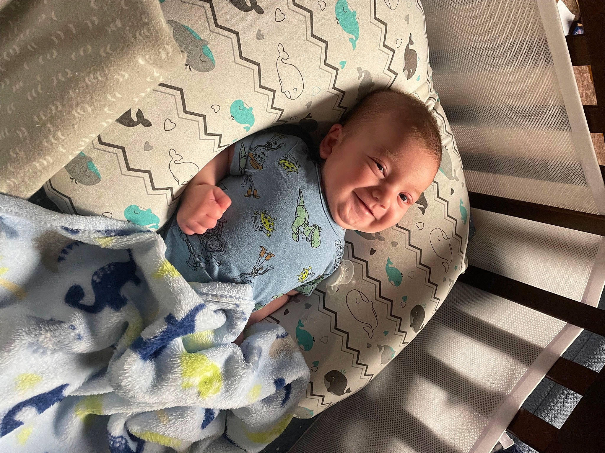 Rhyker is registered to the contest to win money with this photo: baby, baby_products, baby_safety, baby_sleeping, baby_toddler_clothing, bed, bedding, bedtime, child, comfort, flooring, happy, infant_bed, joy, linens, pattern, person, product, smile, textile