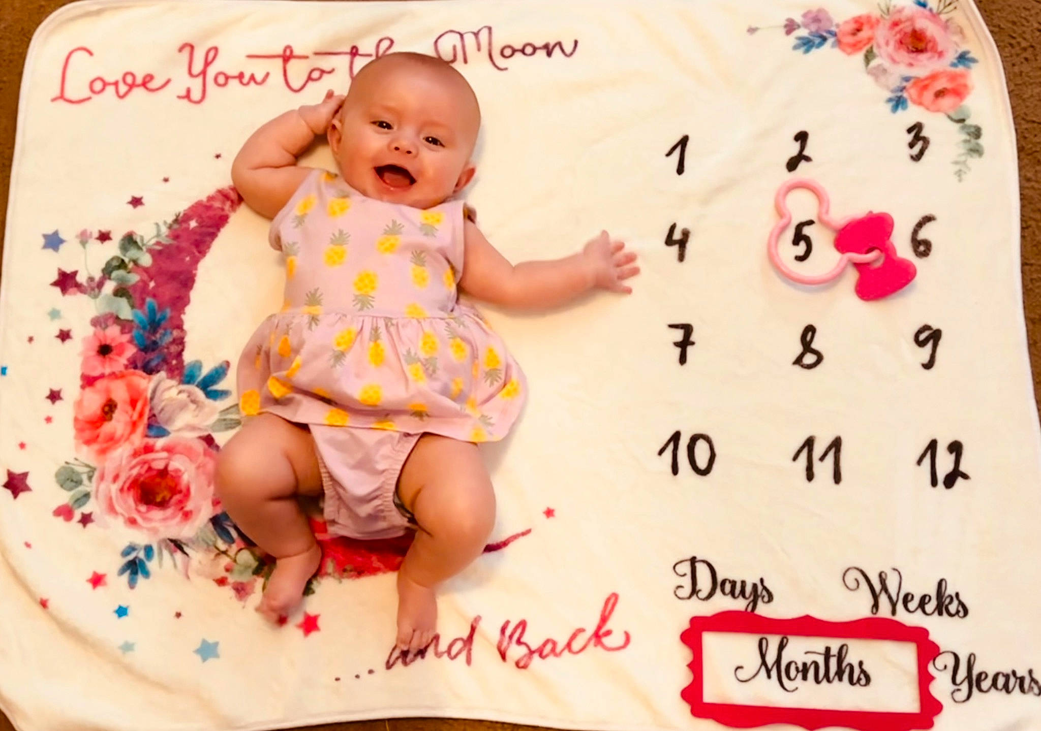Clementine joined the competition — help win amazing prizes! baby, baby_toddler_clothing, cheek, child, face, facial_expression, font, fun, handwriting, happy, magenta, pattern, peach, person, pink, product, sitting, sleeve, smile, sweetness
